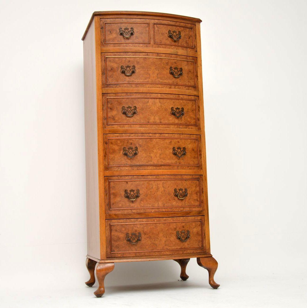 Slim antique bow fronted chest of drawers with a tight burr walnut top and drawer fronts and figured walnut sides. It has great proportions, plus a lovely color and is in good condition, dating to around the 1930s period. The drawers which are