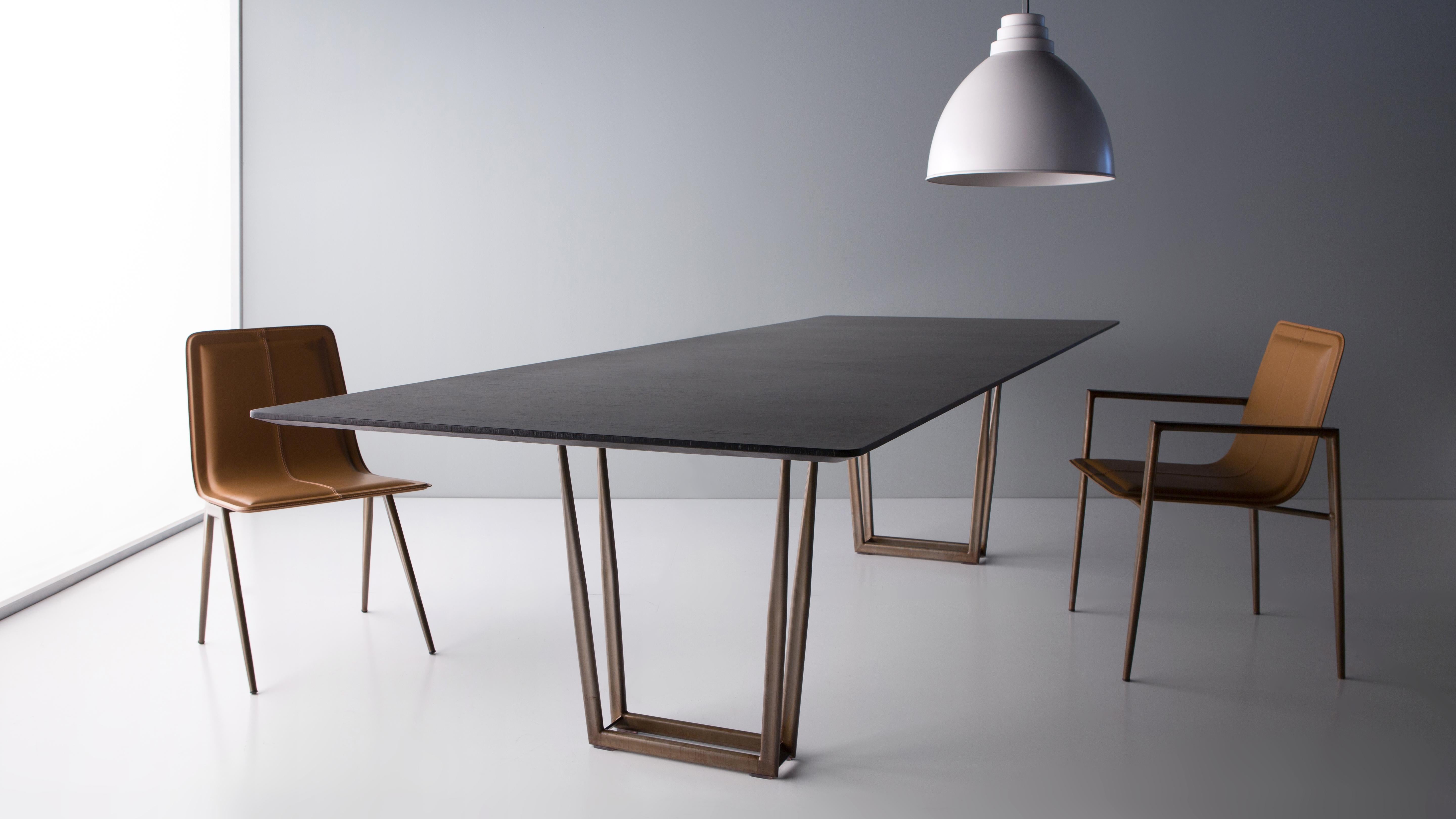 Slim Dining Table by Doimo Brasil
Dimensions: W 220 x D 110 x H 75 cm 
Materials: Base: Aged Steel, Top: Veneer or lacquer. 

Also available in other dimensions. Please contact us.

With the intention of providing good taste and personality, Doimo
