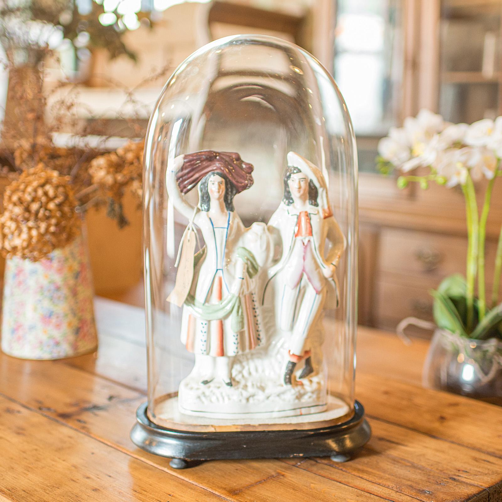 
This is a slimline antique display dome. An English, glass over ebonised mahogany specimen or ornament showcase, dating to the late Victorian period, circa 1890.

Slimline proportion with an ovoid form - ideal for displaying figures
Displays a