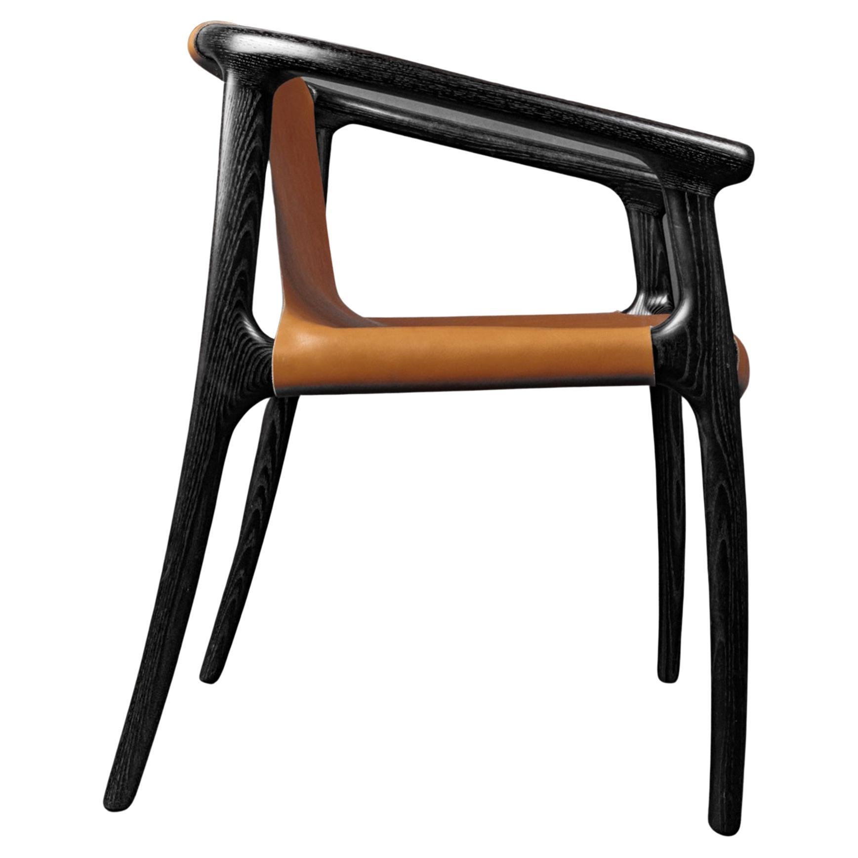 TUSK Sling Chair in Saddle Leather by Möbius Objects