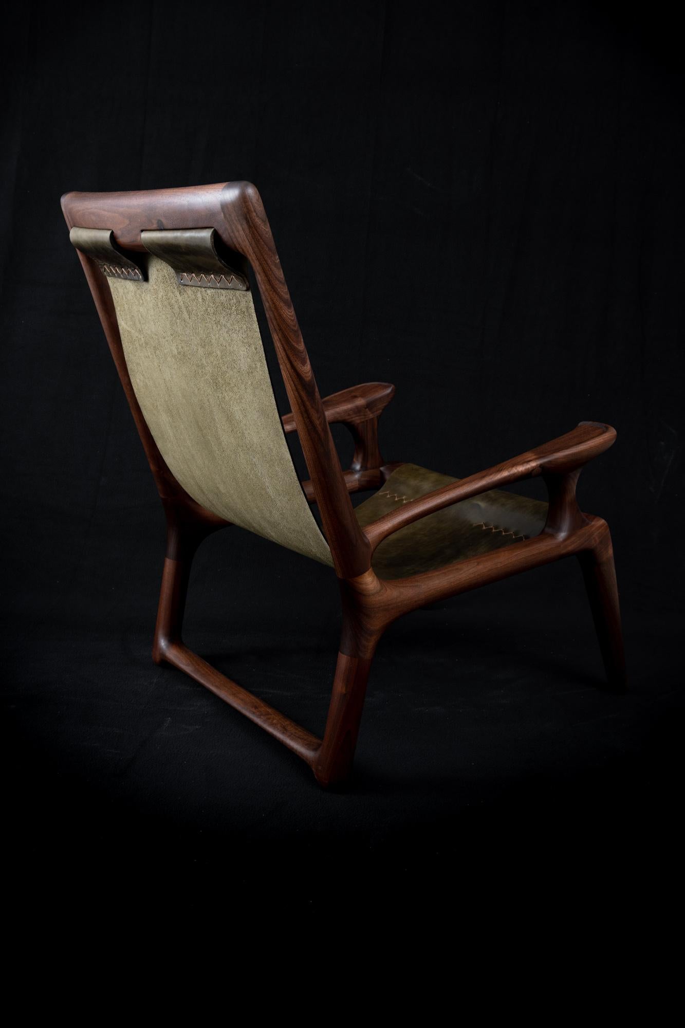 Hand-Carved Sling Chair Mod2 Leather, Arms Connected, Lounge Armchair Walnut + Olive Leather For Sale