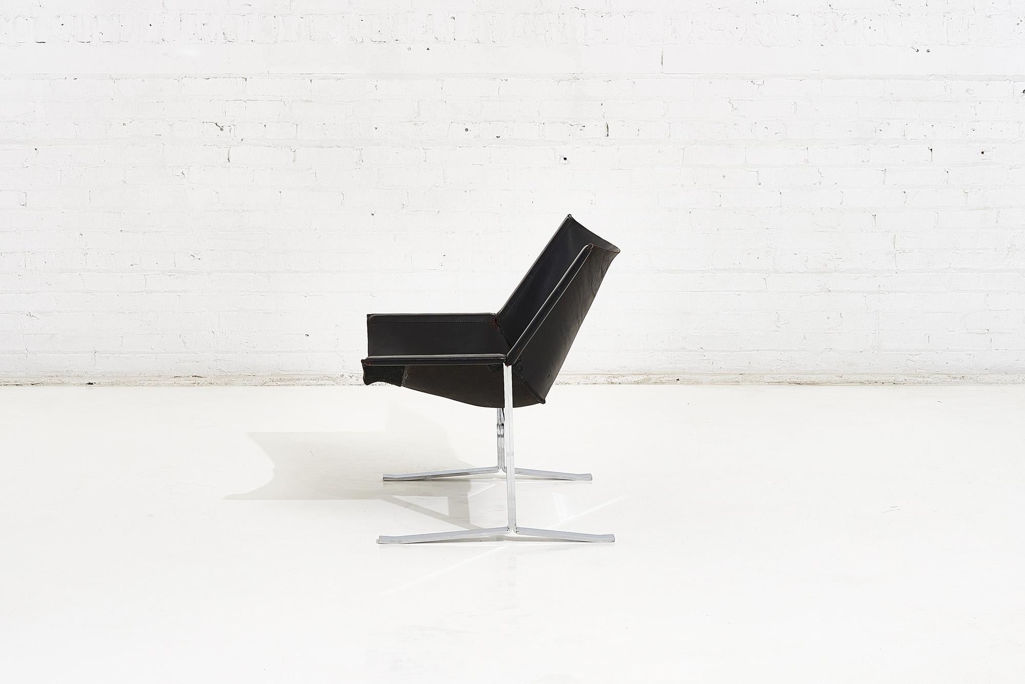 Sling chair model 248 by Clement Meadmore, circa 1970. Chrome plated steel base. Three black reinforcement panels have been added to underside to reinforce vintage leather.