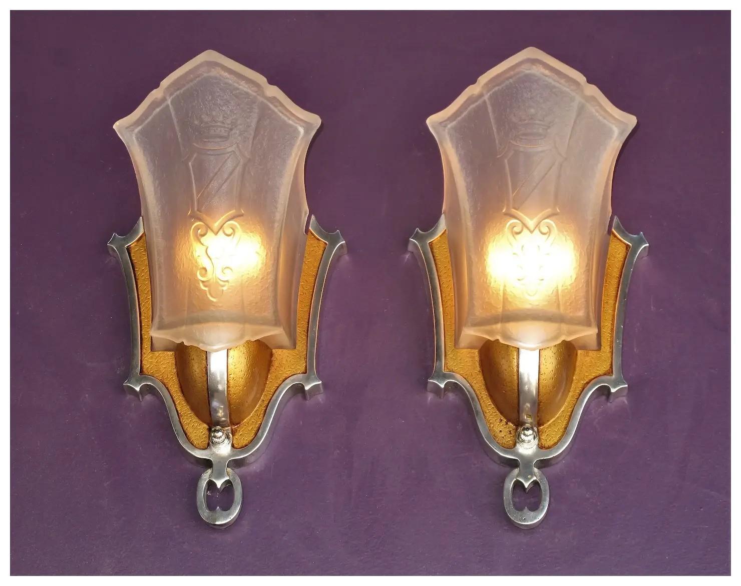 Priced per pair with four pair available, singles at 1/2 pair price.
Meticulously restored sconces with highly polished aluminum accents, clear coated to protect the sheen (not just painted silver) with the sconce body painted a warm golden to match