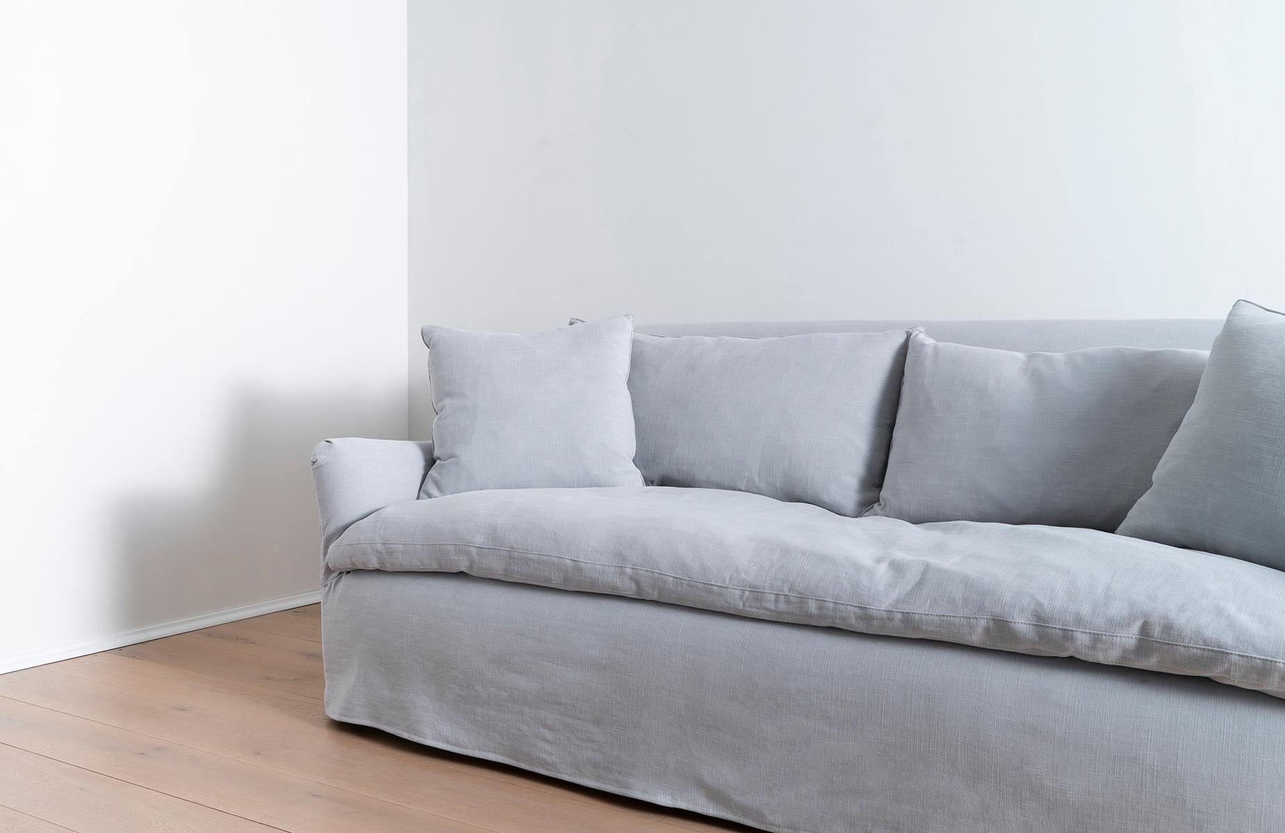 The Cisco Brothers slipcovered Hazel Sofa in Molino Dove Grey organic cotton combines comfort, quality craftsmanship, and durable, eco-friendly manufacturing to result in a stylish organic modern sofa for your living room. Cisco is considered one of