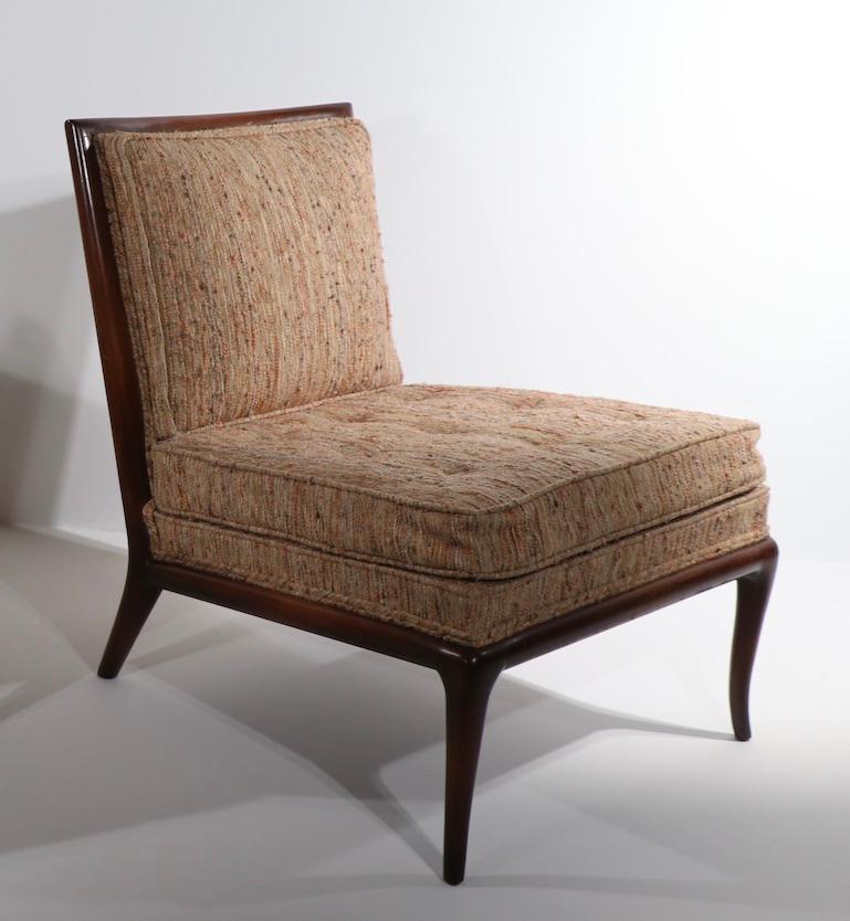 Chic and stylish armless slipper, side chair designed by T H Robsjohn Gibbings for the Widdicomb Furniture Company. This example is in very firm, original, untouched condition, clean and ready to use as is, or reupholster to taste.