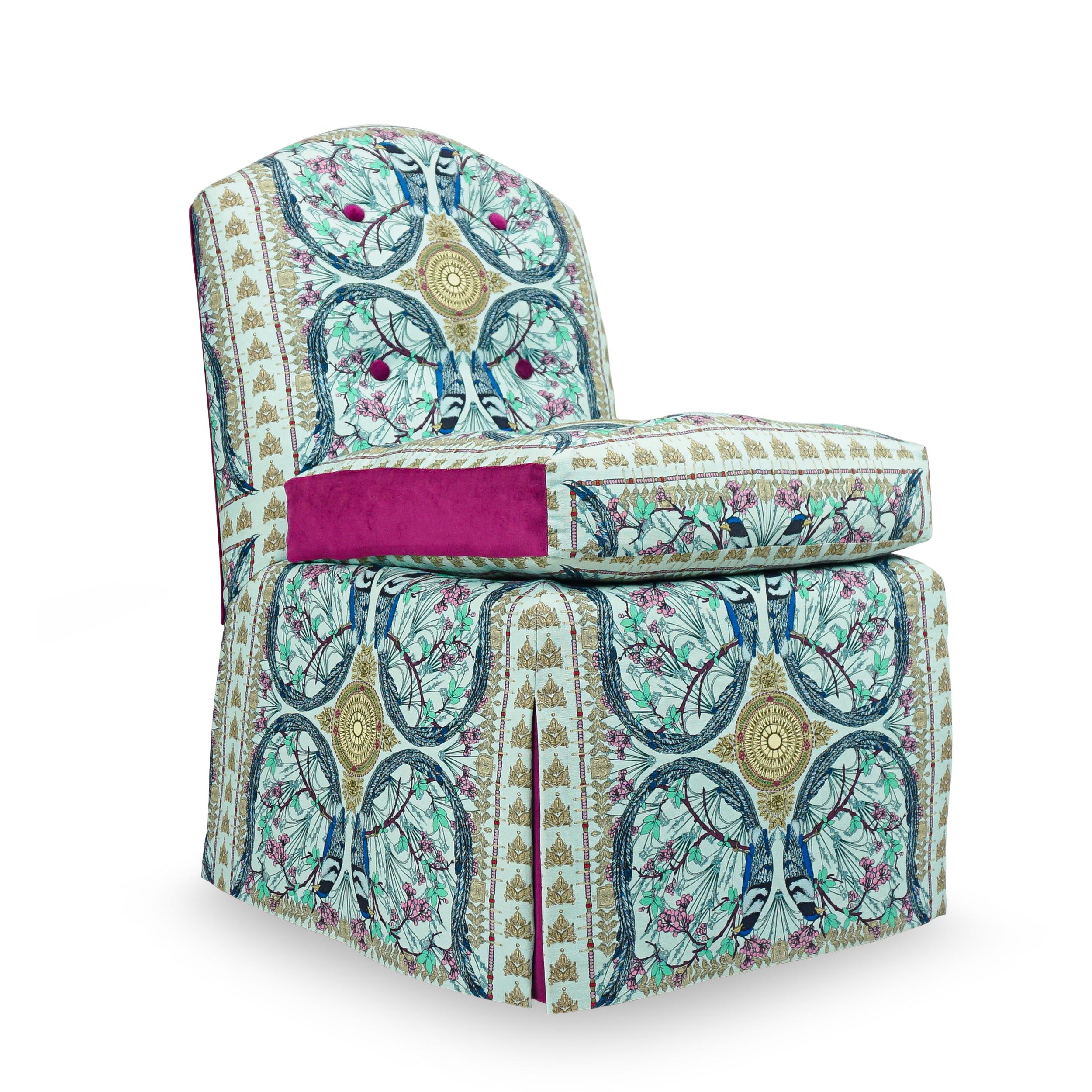 Petite slipper chair made with a solid hard maple topped with a tight back, feather wrapped dense foam attached seat cushion, and tailored skirt. Fabrics are an Osborne & Little Lyrebird print with Velutto Velvet accents on seat cushion, back and
