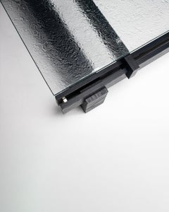 Slit Coffee Table, Cast-Glass Top with Dynamic Look, Black Oak