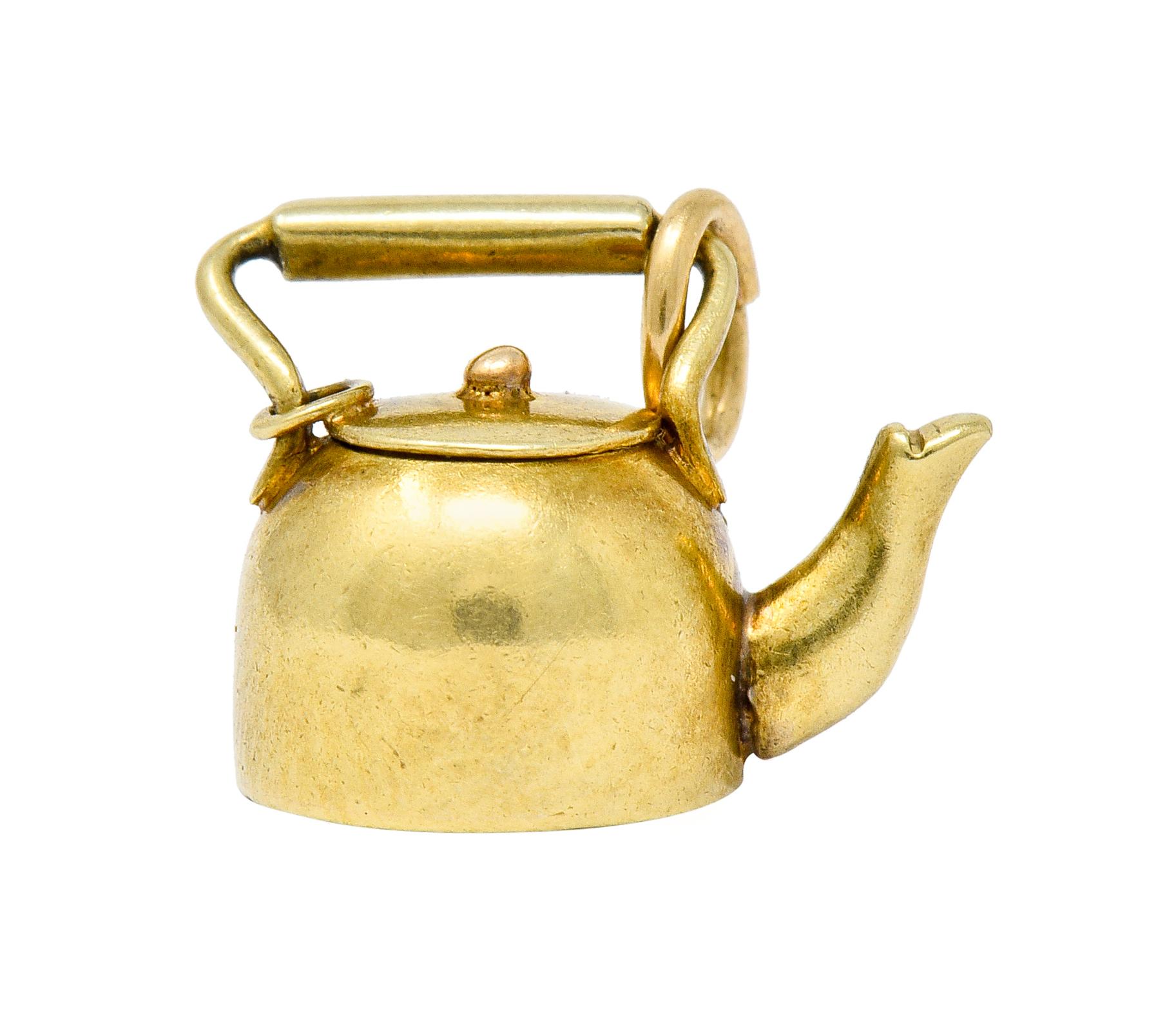 golden tea kettle