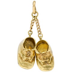 Sloan & Co. Retro 14 Karat Gold Baby Shoe Charm, circa 1940