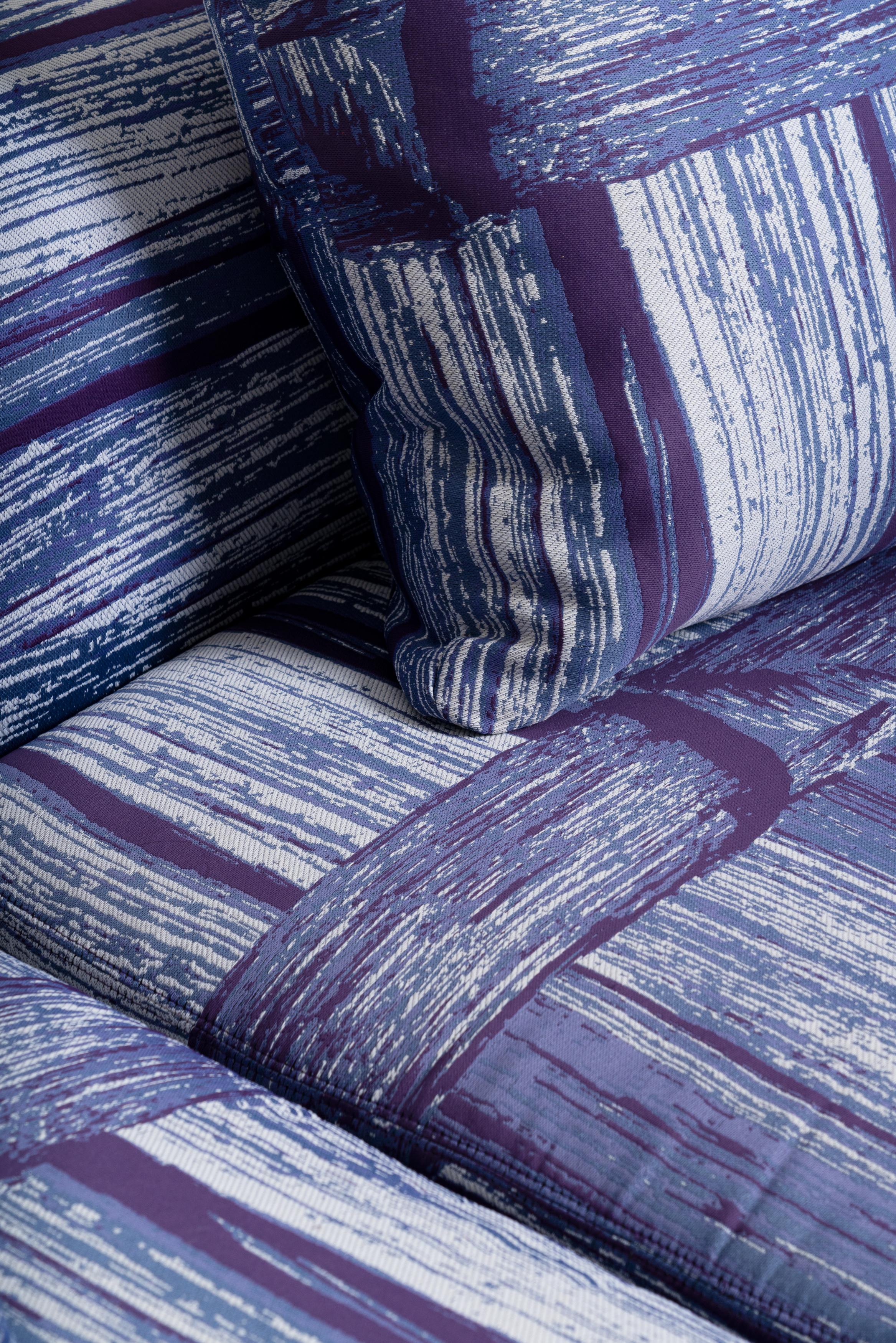 Italian Slope sectional sofa in hardwood with lilac fabric by Andrea Steidl For Sale