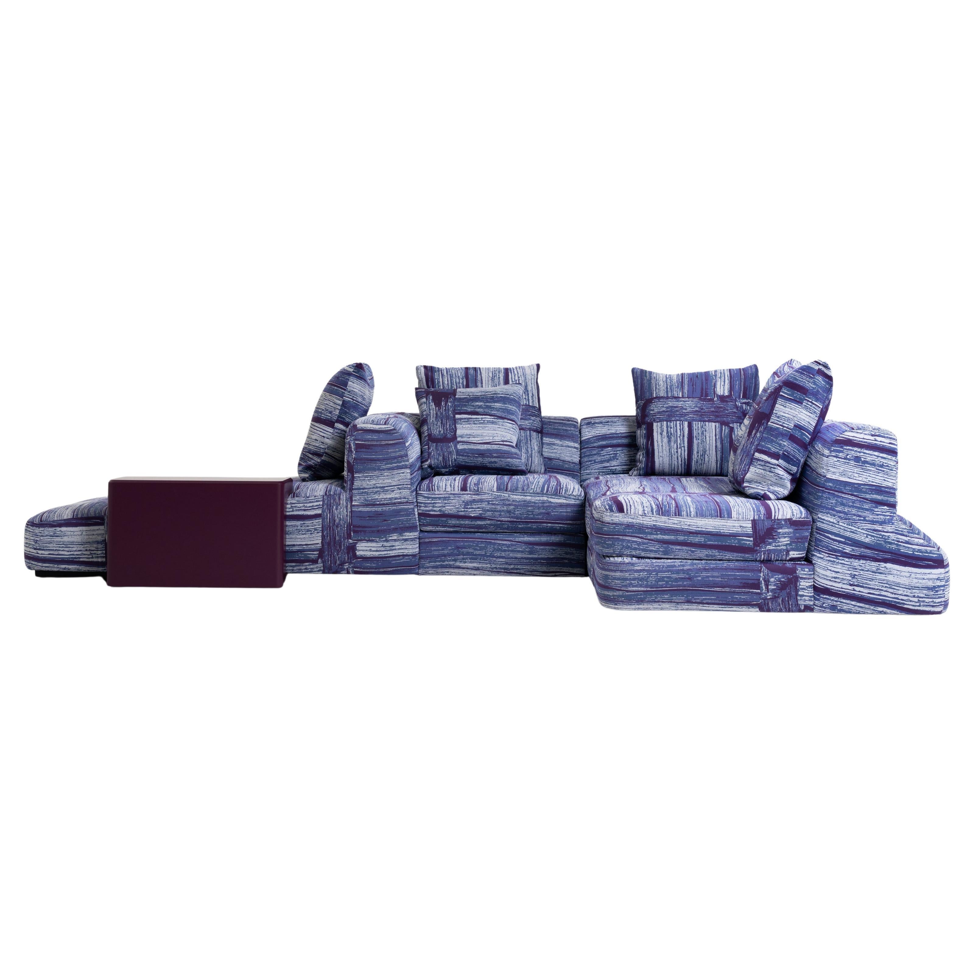 Slope sectional sofa in hardwood with lilac fabric by Andrea Steidl