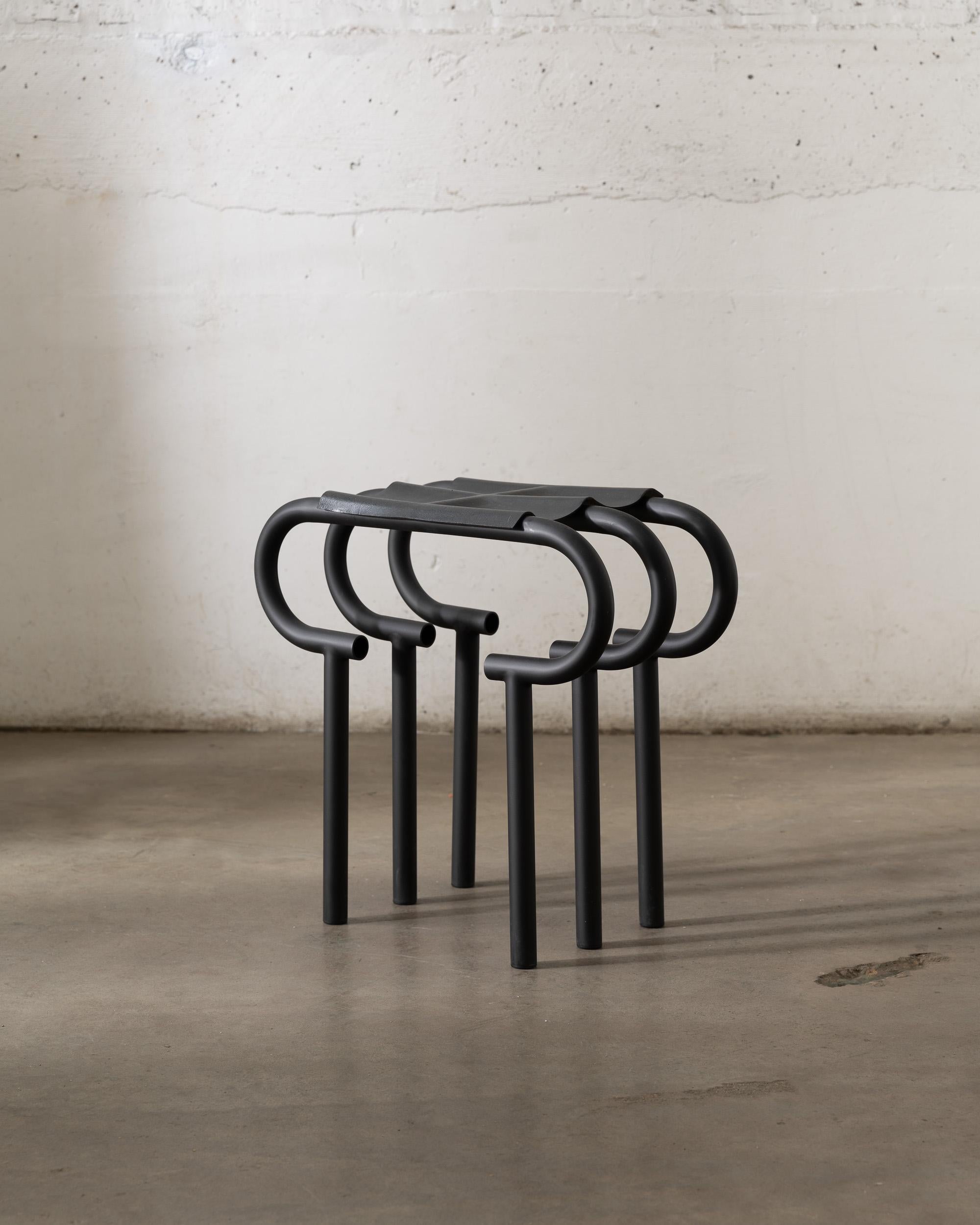 Slumped leather stool by Gentner Design.
Dimensions: D 46 x W 25.5 x H 46 cm.
Materials: steel, leather.

Gentner Design
Rooted in a language of sculpture, character defining details, and world renowned craftsmanship, the work is found at the