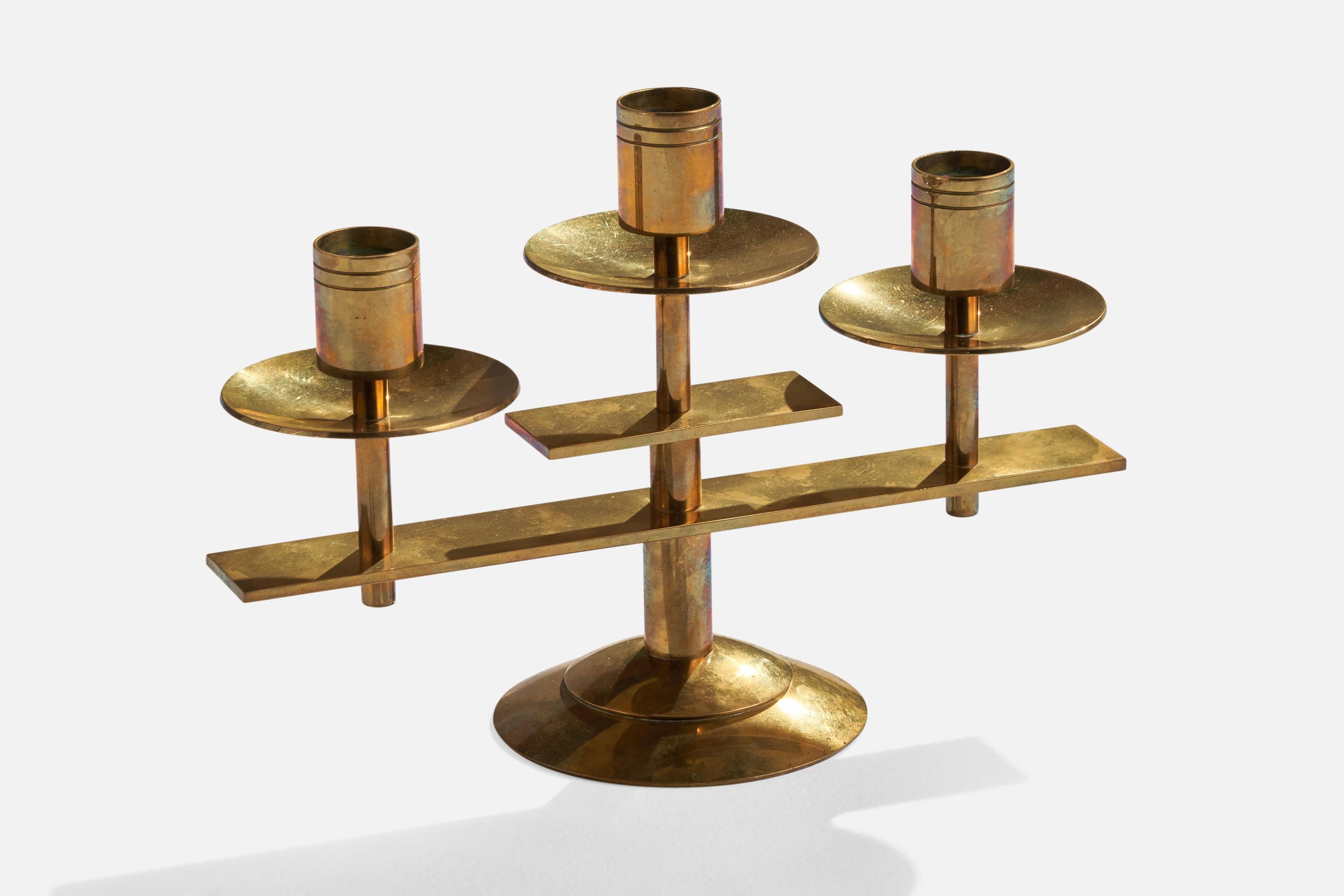 A brass candelabra designed and produced by Småkunst AS, Norway, c. 1950s.

holds .80 candles 