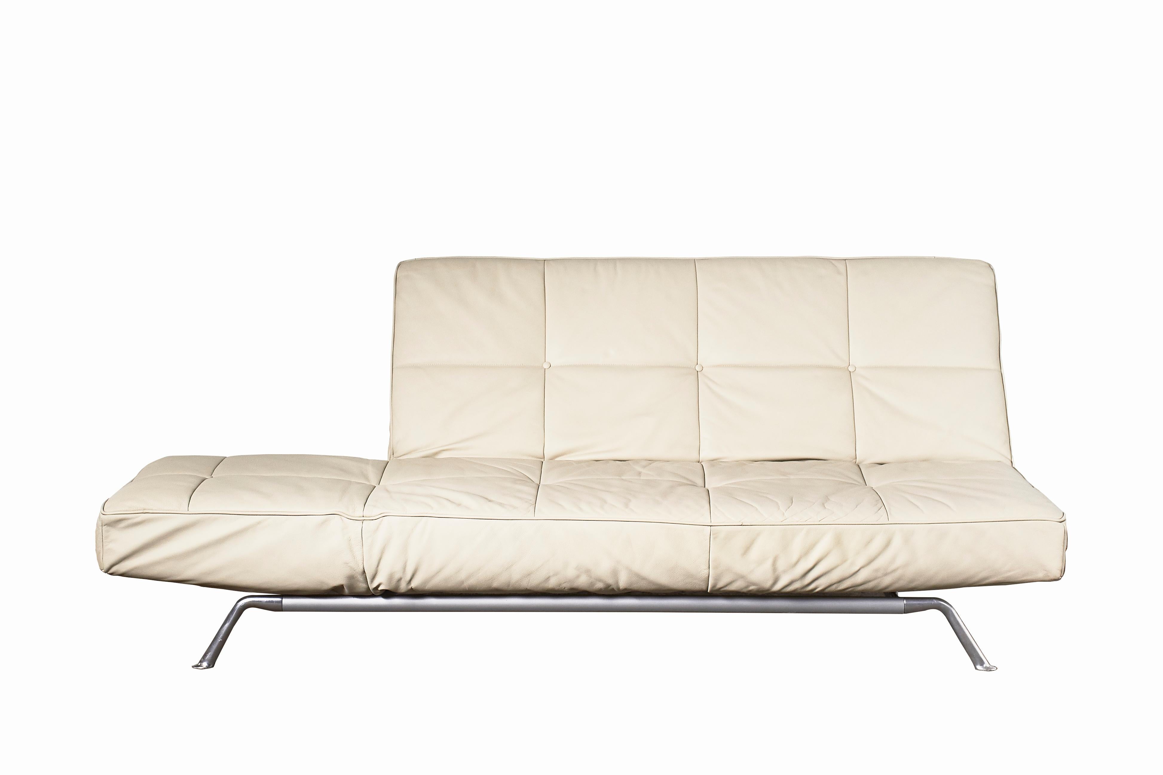 Ships from Kentucky, USA.

Made in France by Ligne Roset, this iconic adjustable daybed / sofa in luxurious beige leather is as chic as it is versatile. Clean lines, generous proportions and finest materials portray a timeless Mid Century Modern