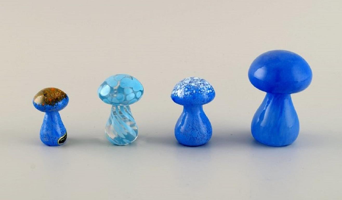 Smålandshyttan, Sweden. Seven mushrooms in mouth-blown art glass. 
1960s/70s.
Largest measures: 6.5 x 5.2 cm.
In excellent condition.
Sticker.