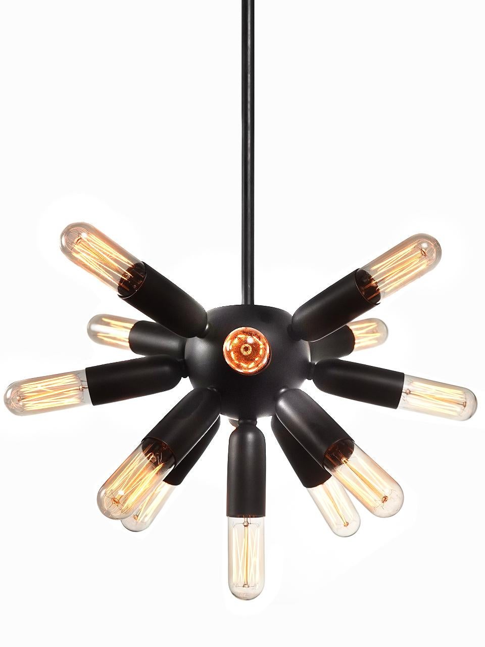 This classic Spudnick lamp is has a nice compact size and has a 14 inch diameter with the bulbs. With 13 bulbs it creates a dramatic starburst effect. the metal is finished in dark brass and is a nice contrast to the bright bulbs.
We only created a