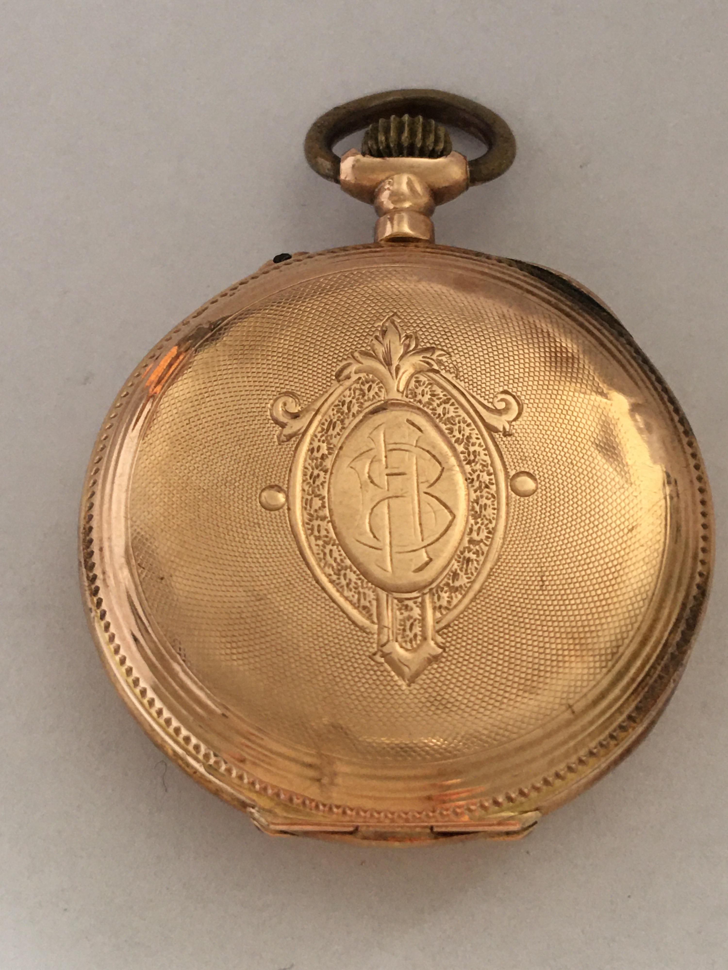 This beautiful antique little watch is working and it is ticking well. Visible dents on the side and back engine turned watch case as shown. 

Please study the images carefully as form part of the description.