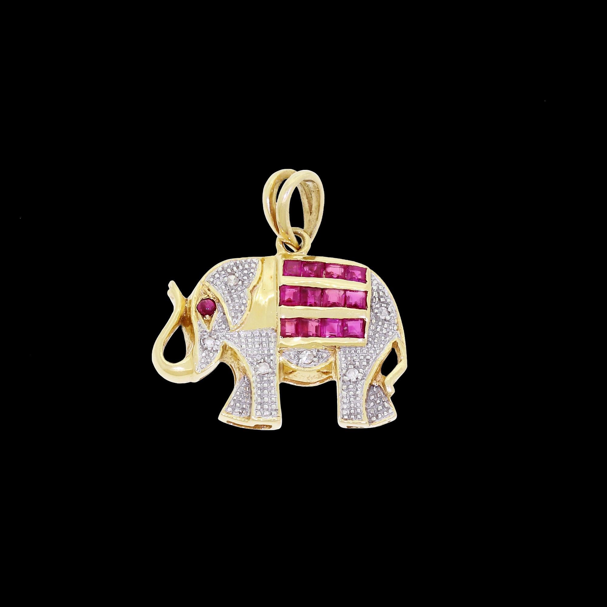 This fabulous petite sized elephant charm is crafted from 14K yellow & white gold, with genuine diamond and ruby gemstones. Featuring a charming elephant with its' trunk raised, this pendant is rumored to bring luck and good fortune to its'
