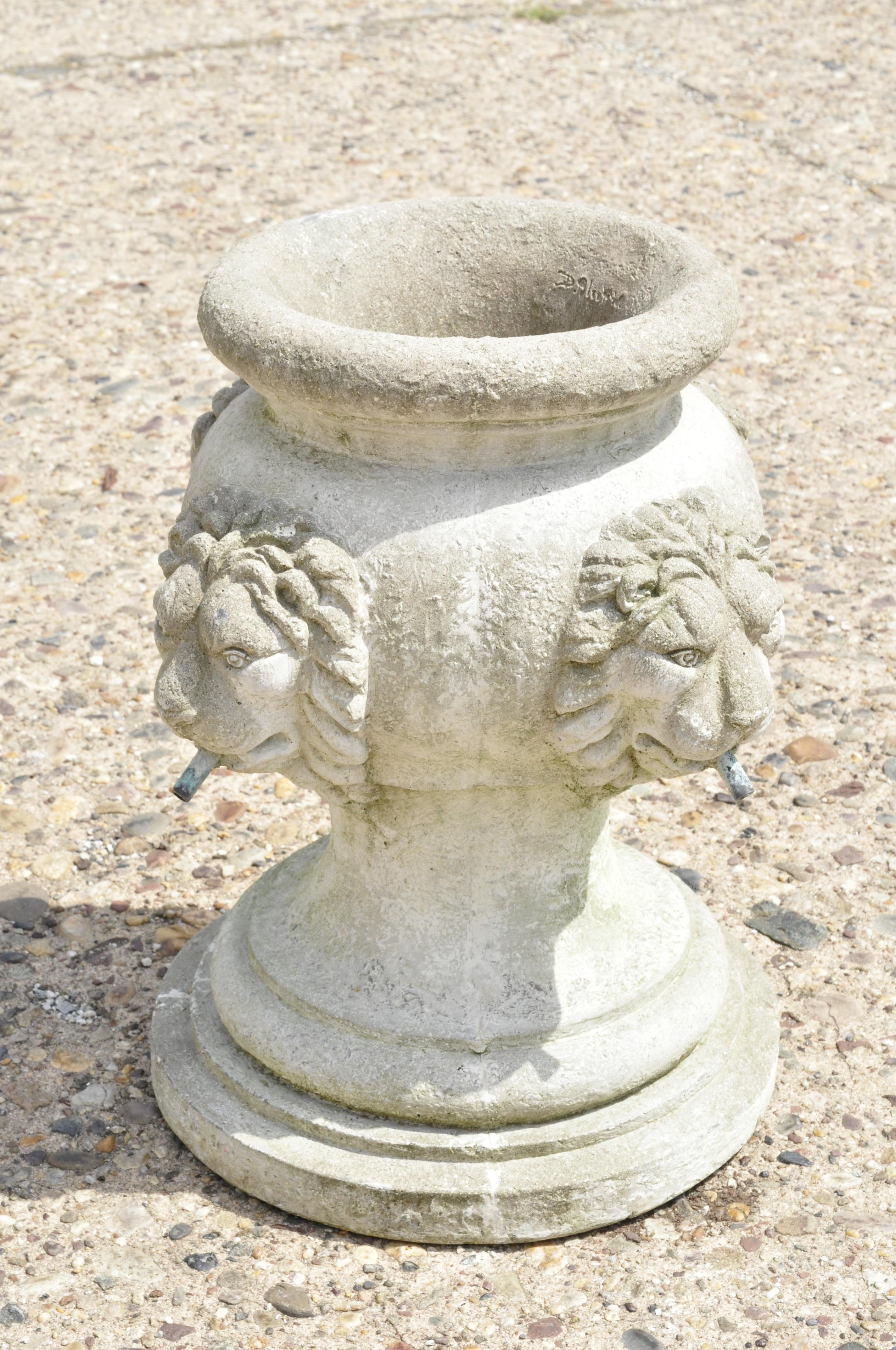 concrete lion head fountain
