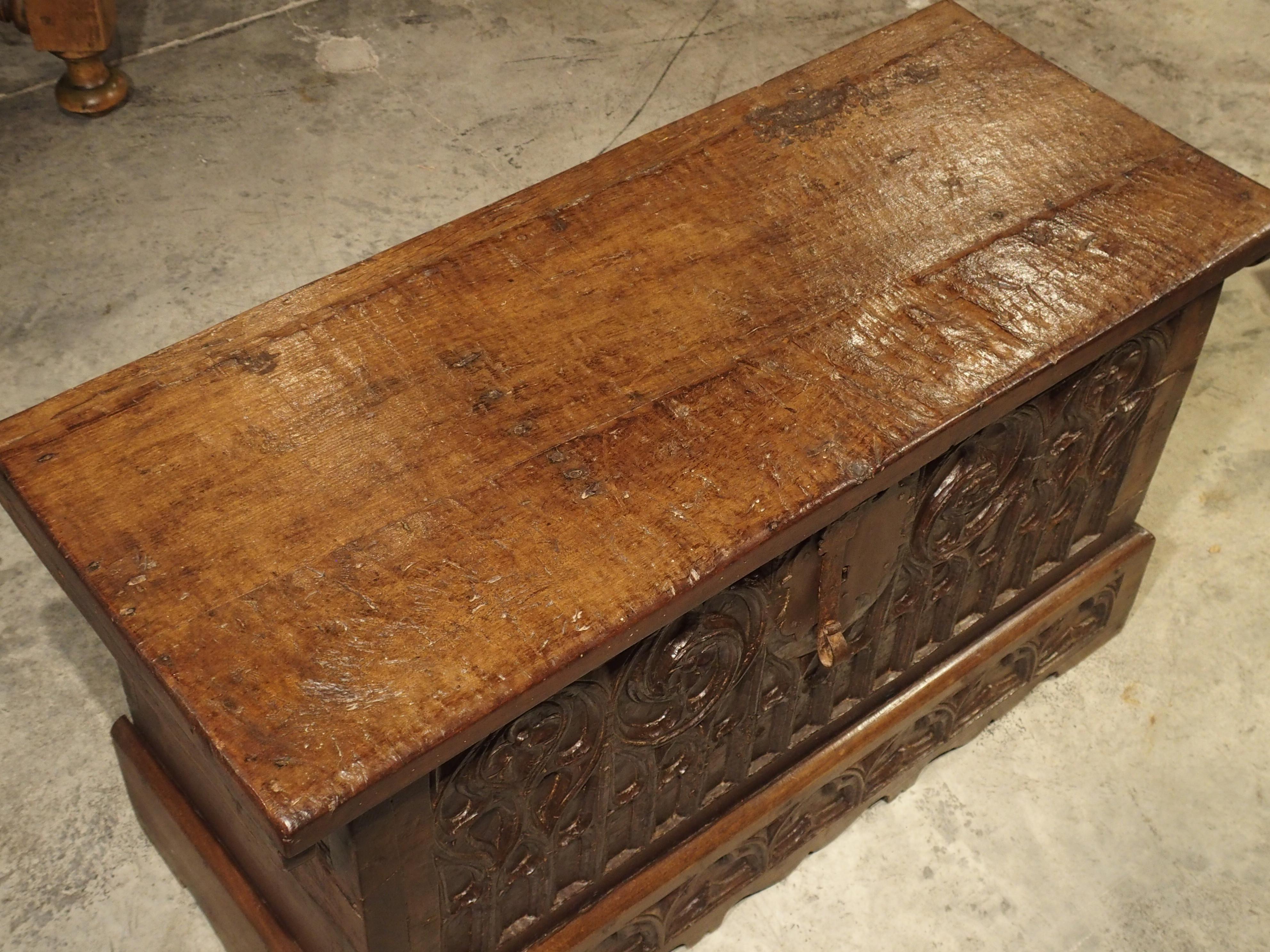 Metal Small 17th Century French Gothic Trunk in Carved Oak