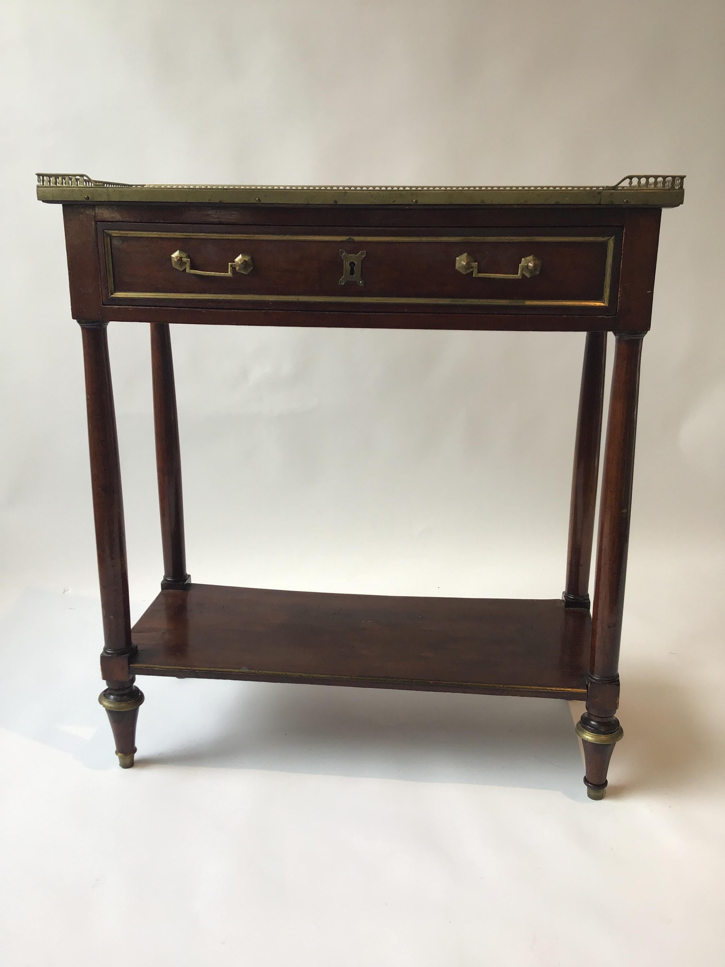 1880s French Regency marble top console with brass gallery. From a Scarsdale, NY estate.