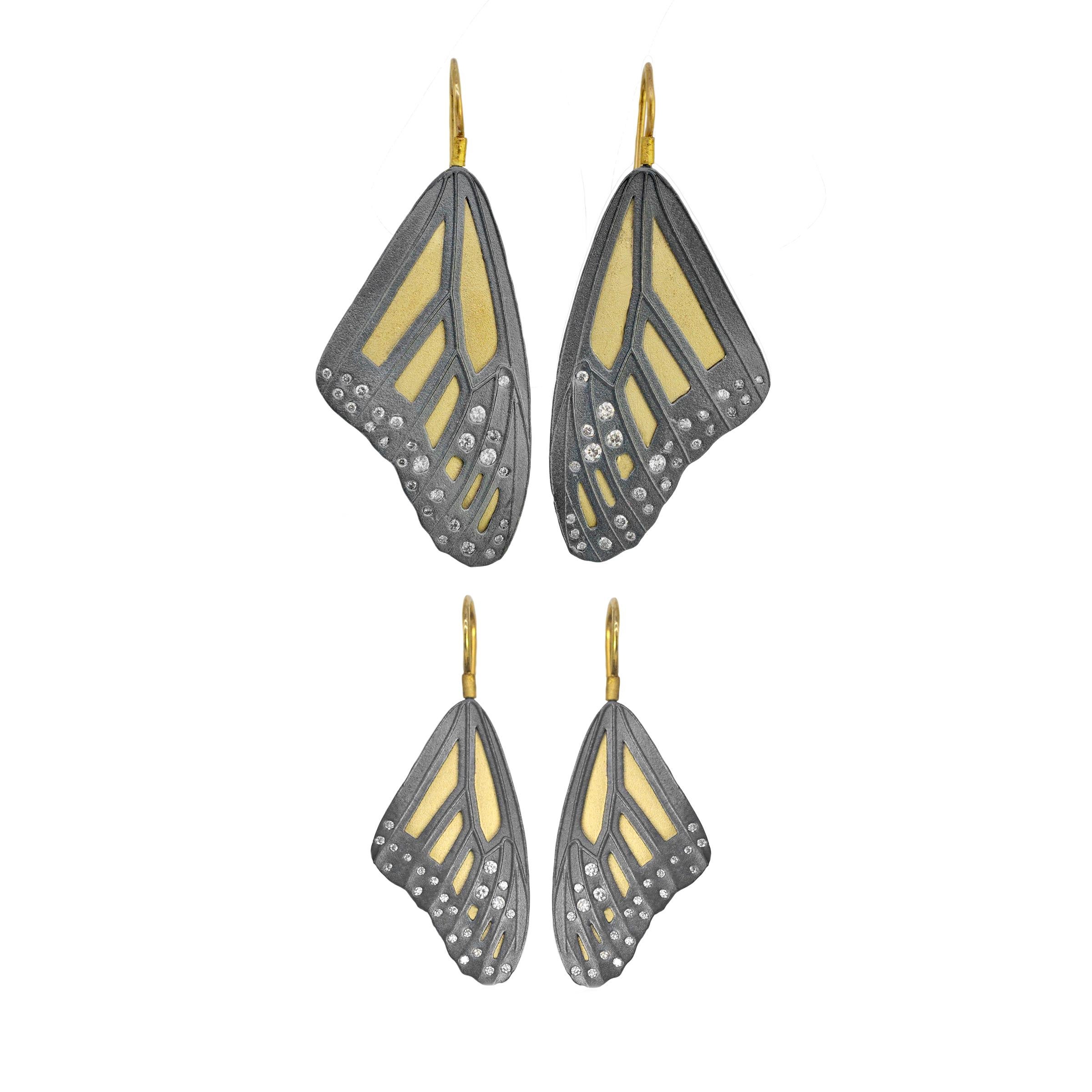 A true Rebecca Myers Design signature piece, our monarch butterfly wing designs are modeled after nature's masterpiece and hand crafted with the highest quality materials. Oxidized sterling silver is layered over 18k yellow gold, with sparkling