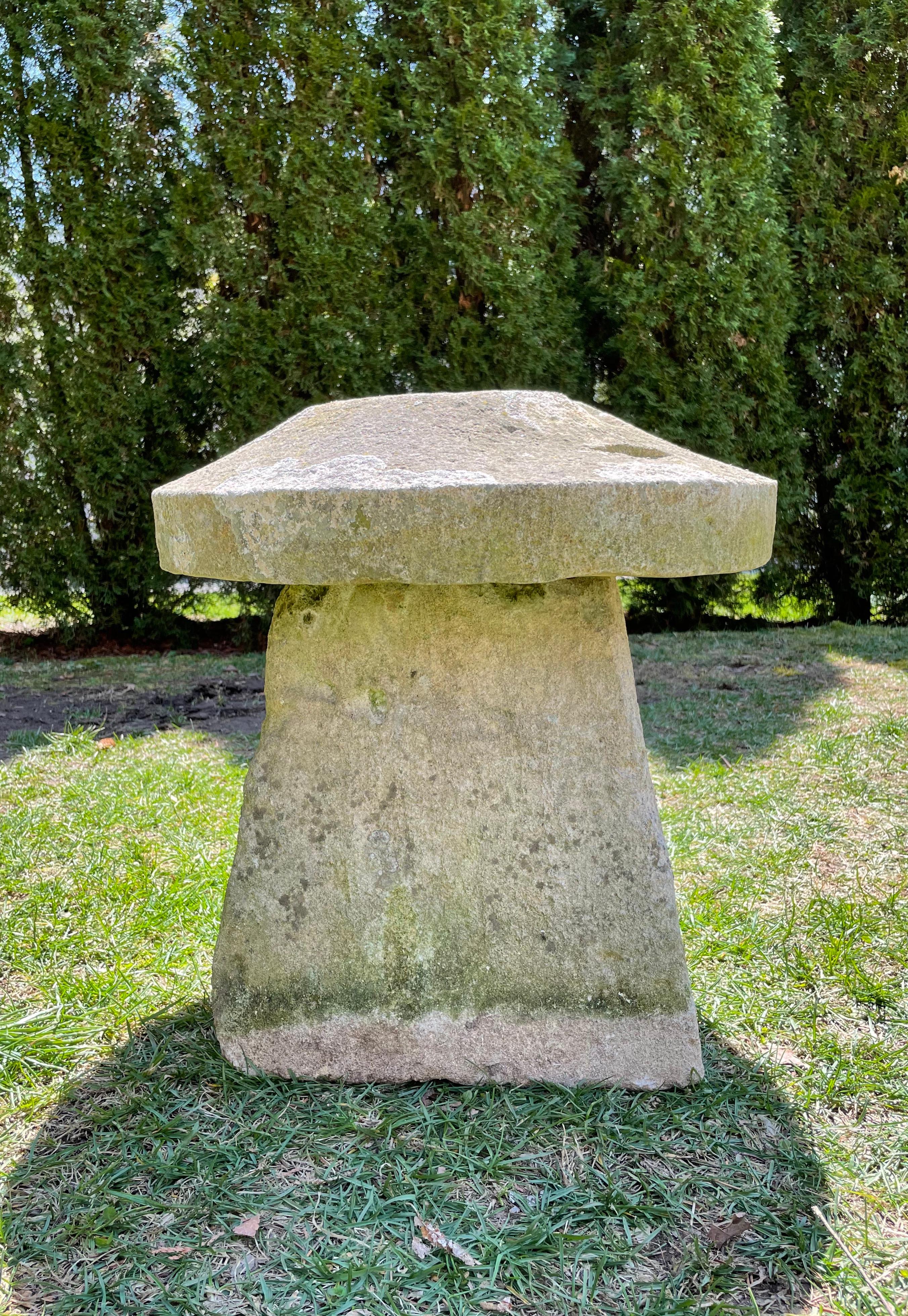 Staddlestones were originally designed as foundation supports for granaries in 16th C England to prevent rats and other vermin from climbing inside the barns and eating the grain. This one is hand-carved from Ham Stone, and has a