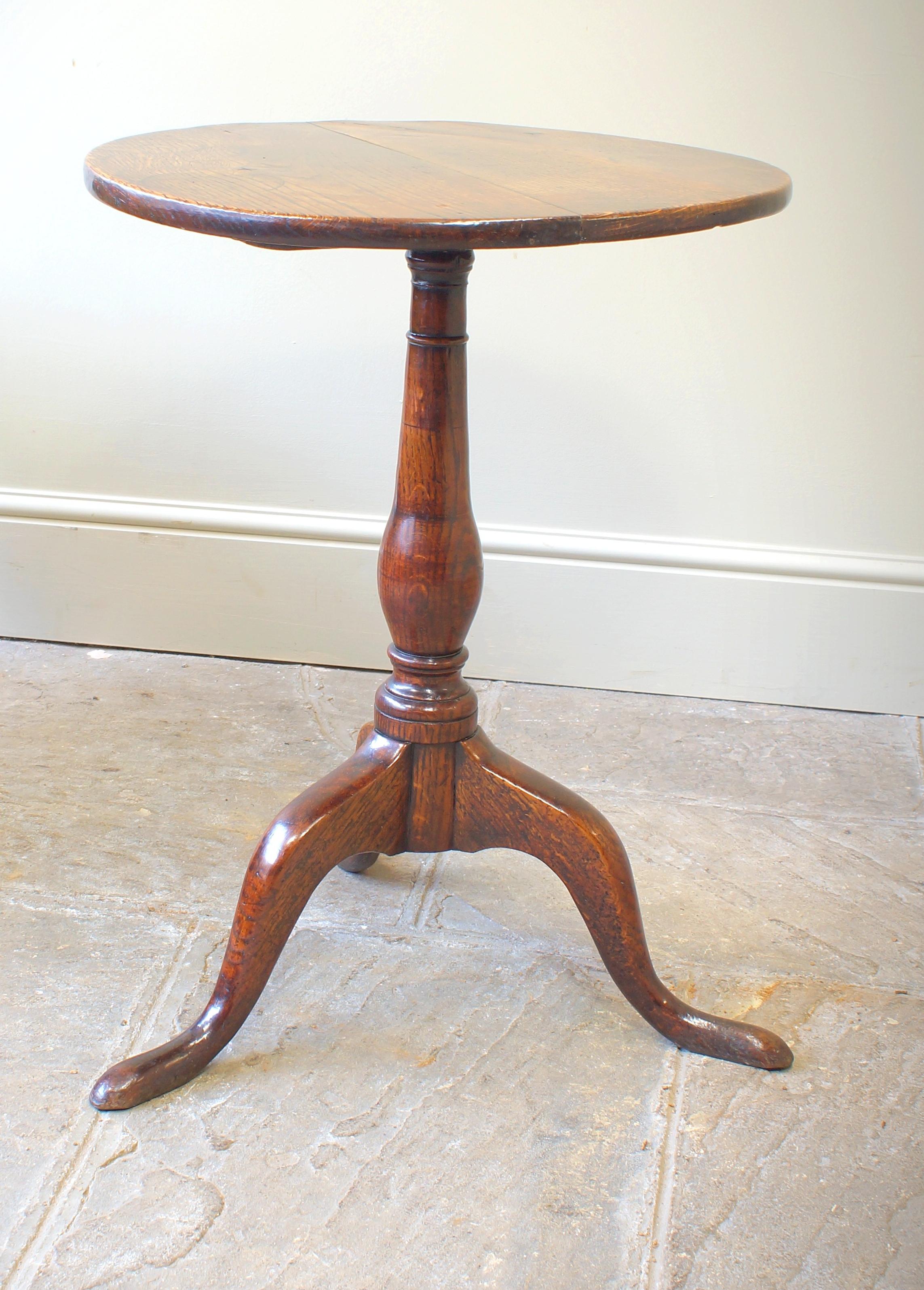 18th Century oak wine/ tripod table with a matched two piece top supported on an elegant turned column terminating with three shaped legs. Circa 1780.
Excellent colour and condition having no breaks or repairs.
Please don't hesitate to contact us
