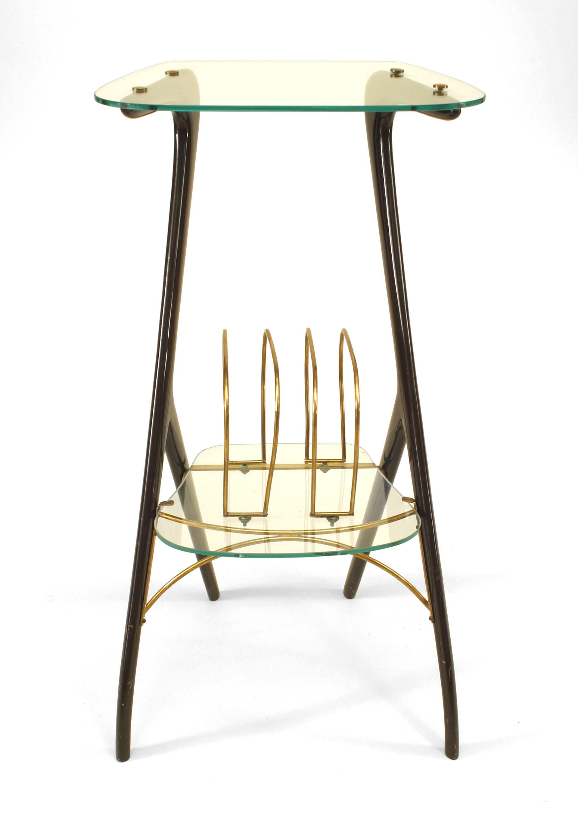Italian Mid-Century (1940s) small end table with ebonized wood sides supporting a glass top and shelf with brass magazine rack. (Attributed to ICO PARISI).
 
