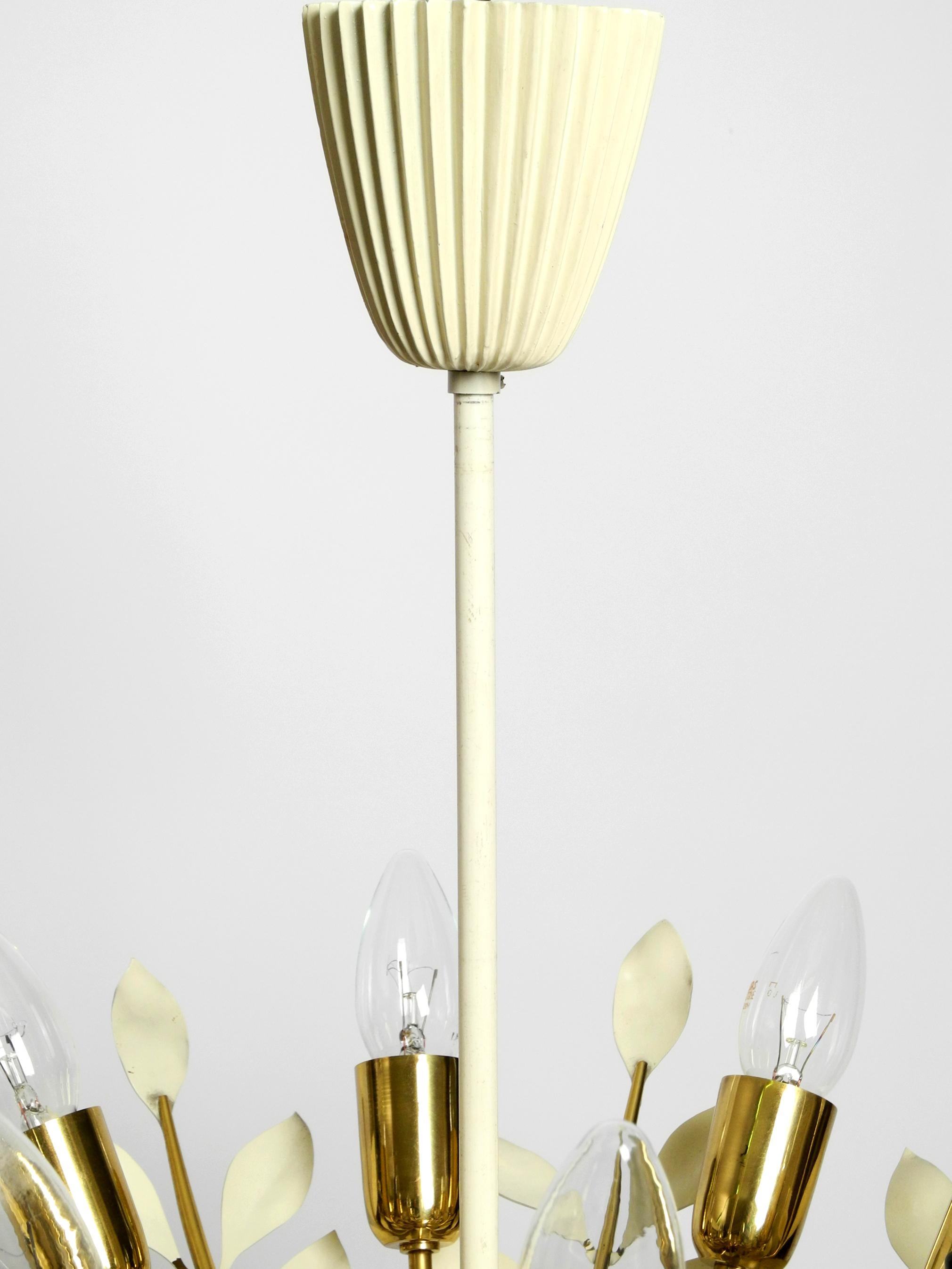 Small 1950s brass Sputnik ceiling lamp with 8 arms by Vereinigte Werkstätten For Sale 3