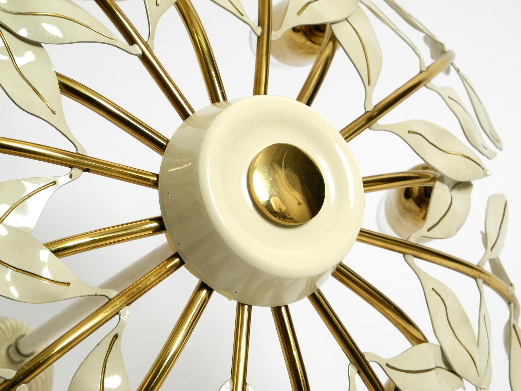 Small 1950s brass Sputnik ceiling lamp with 8 arms by Vereinigte Werkstätten For Sale 11