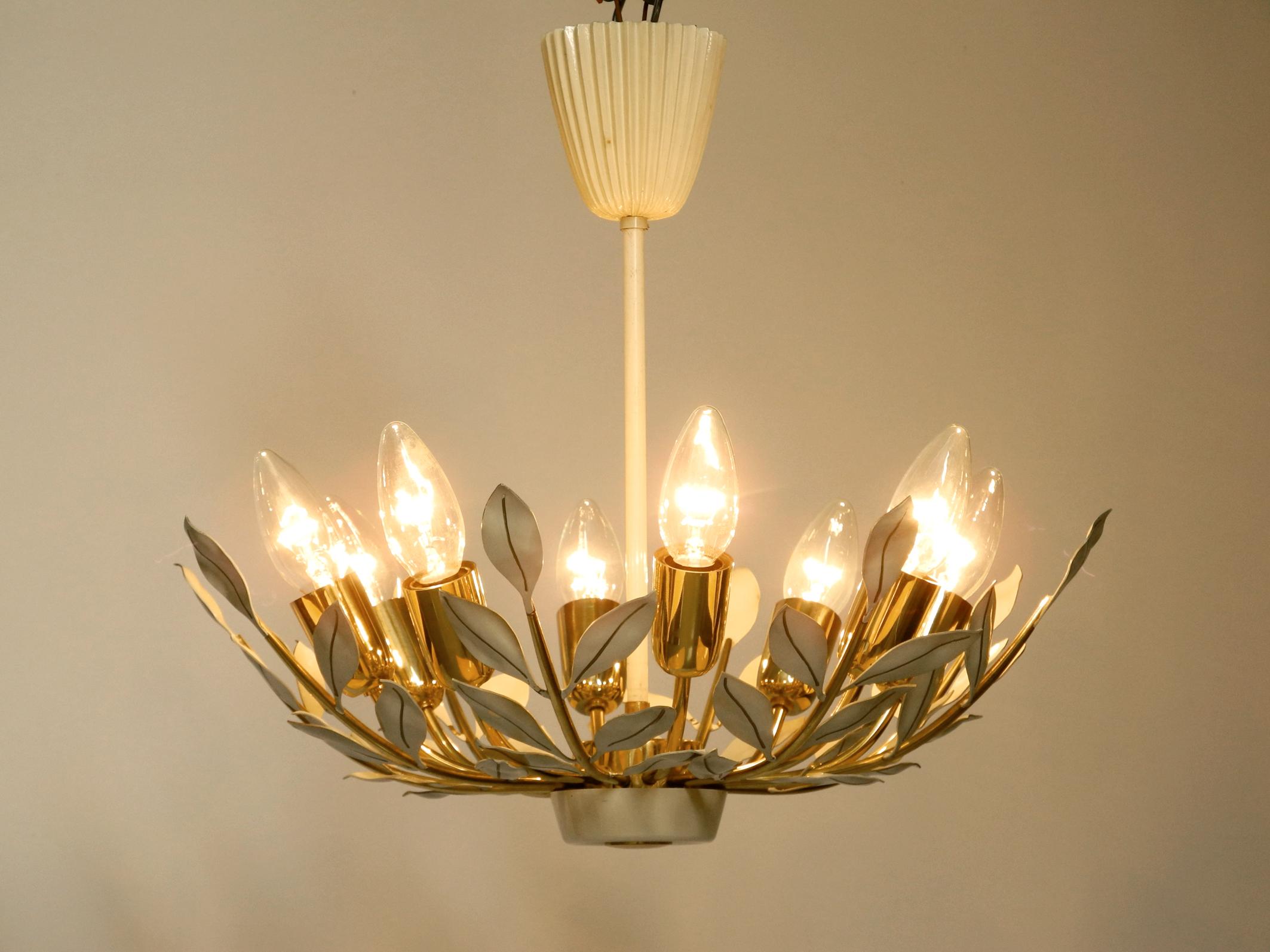 German Small 1950s brass Sputnik ceiling lamp with 8 arms by Vereinigte Werkstätten For Sale