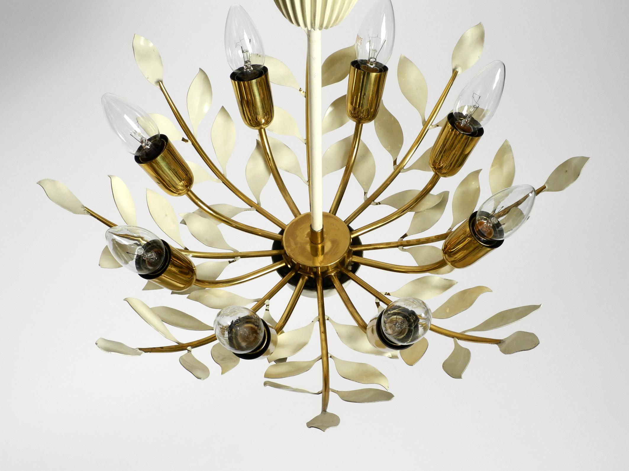 Brass Small 1950s brass Sputnik ceiling lamp with 8 arms by Vereinigte Werkstätten For Sale