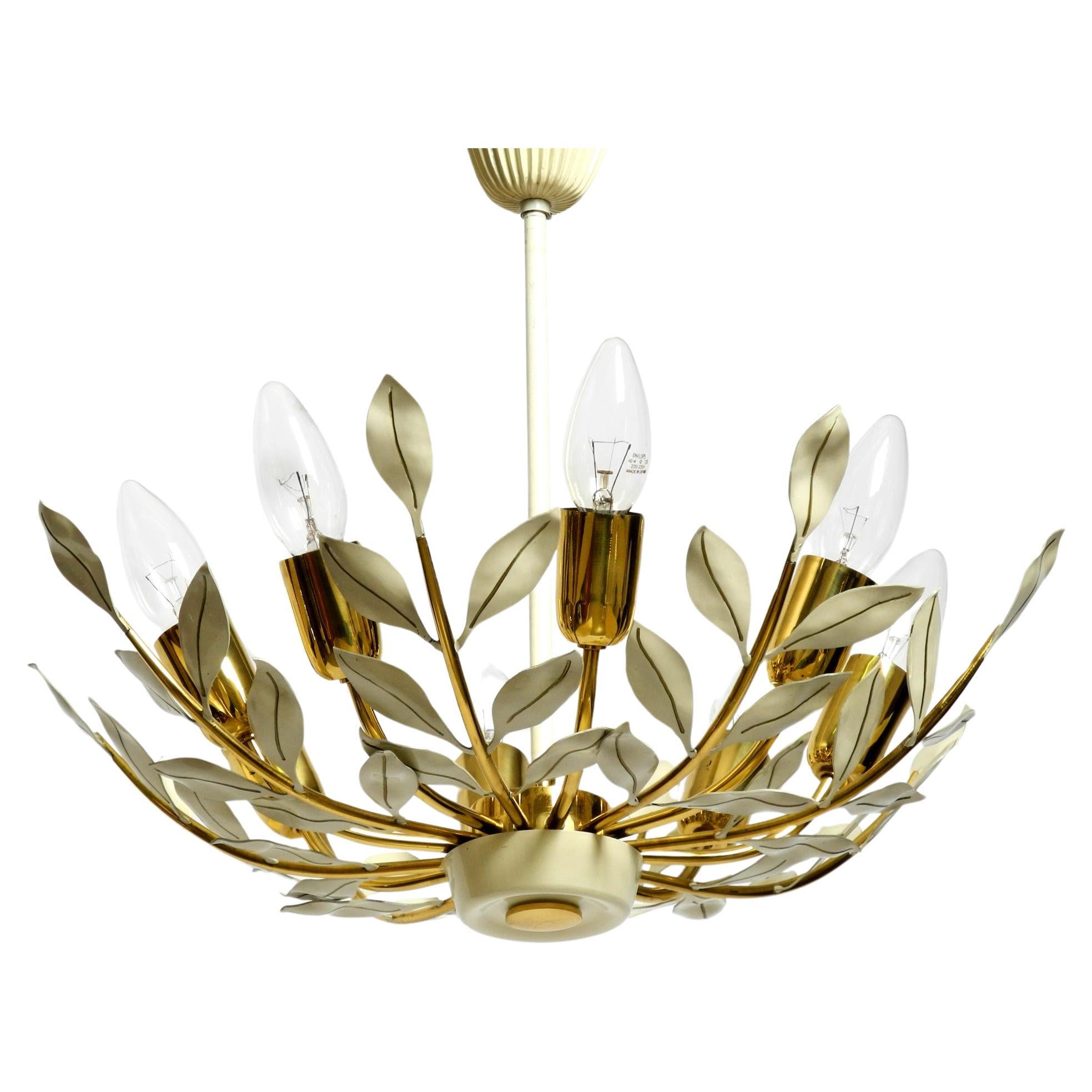 Small 1950s brass Sputnik ceiling lamp with 8 arms by Vereinigte Werkstätten For Sale