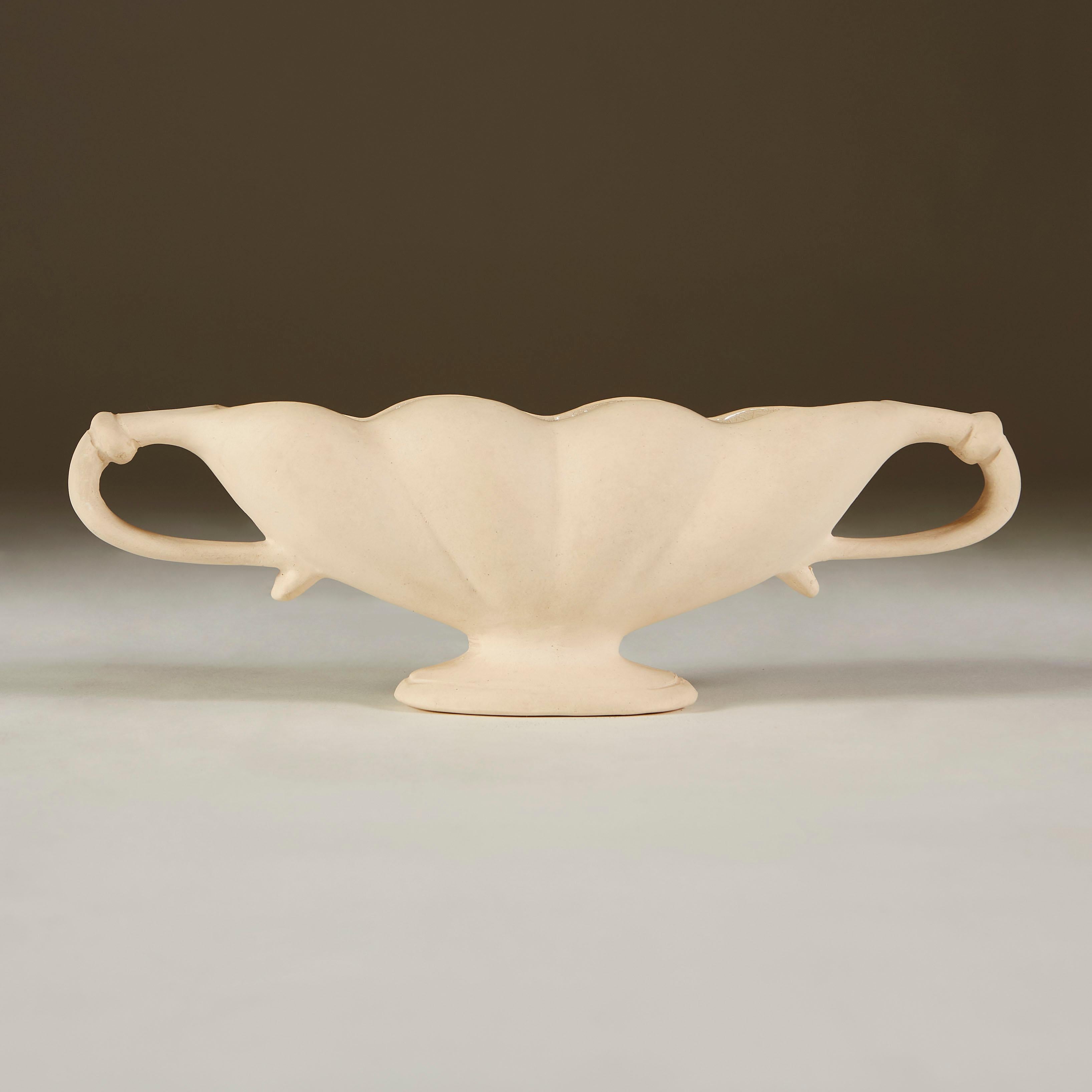 Small unglazed Fulham pottery urn with glazed inside to hold flowers in water. Designed in the 1930s by the famous British florist Constance Spry, made by Fulham Pottery, circa 1950s, UK. Signed.
Constance Spry considered this a perfect shape for