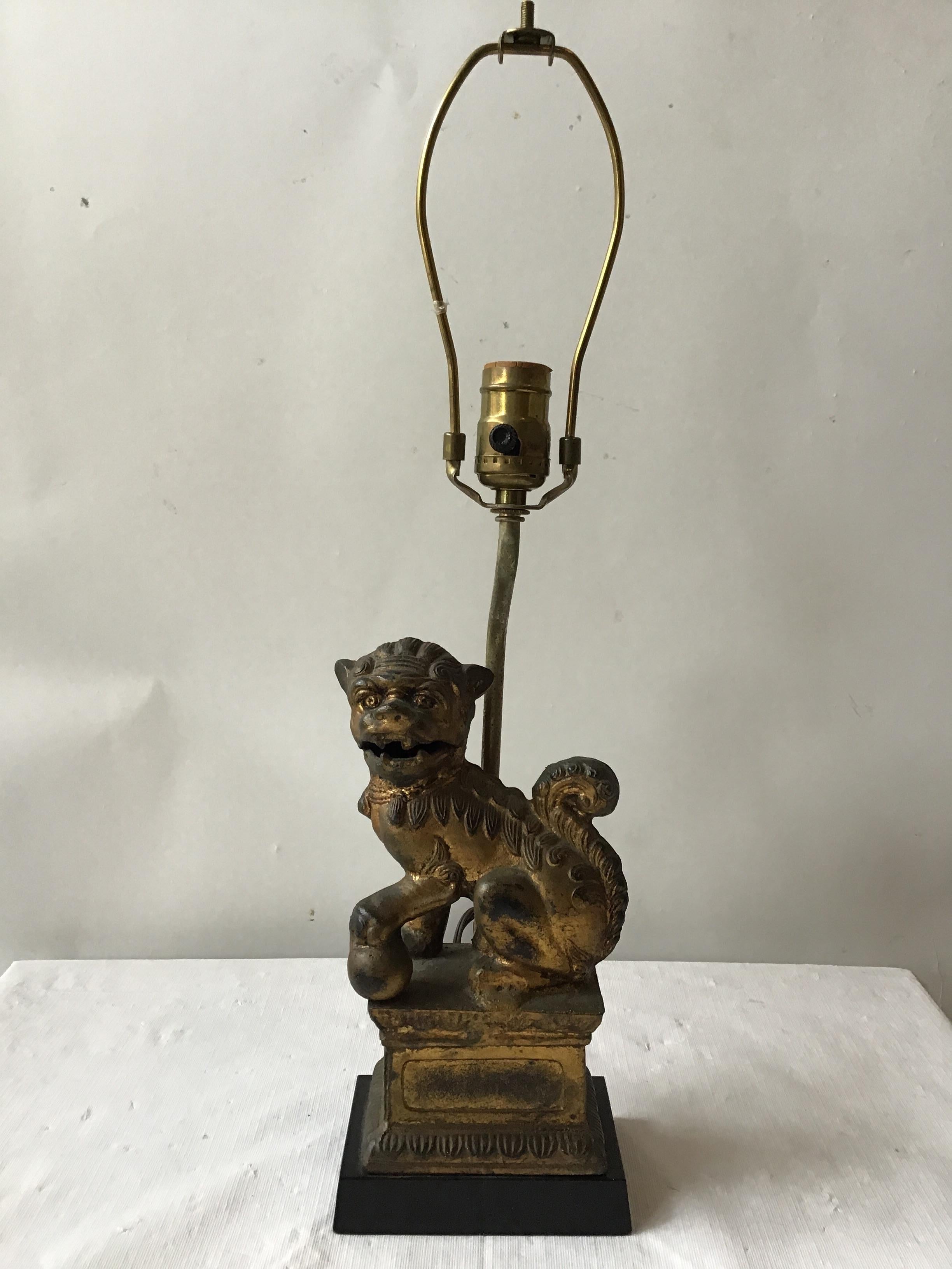 Small gilt metal Foo Dog lamp, 1950s.