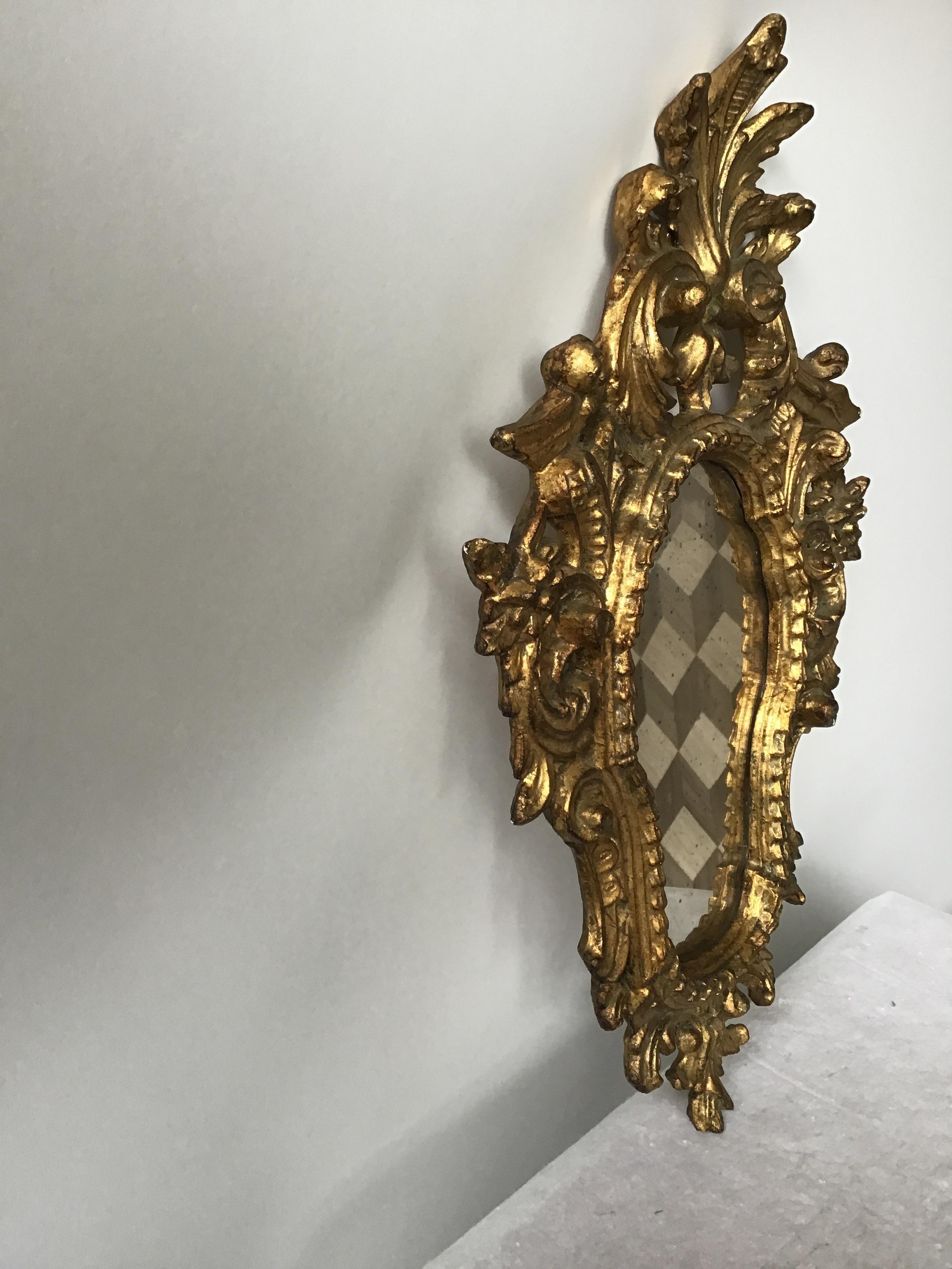 Mid-20th Century Small 1950s Italian Hand Carved Giltwood Mirror