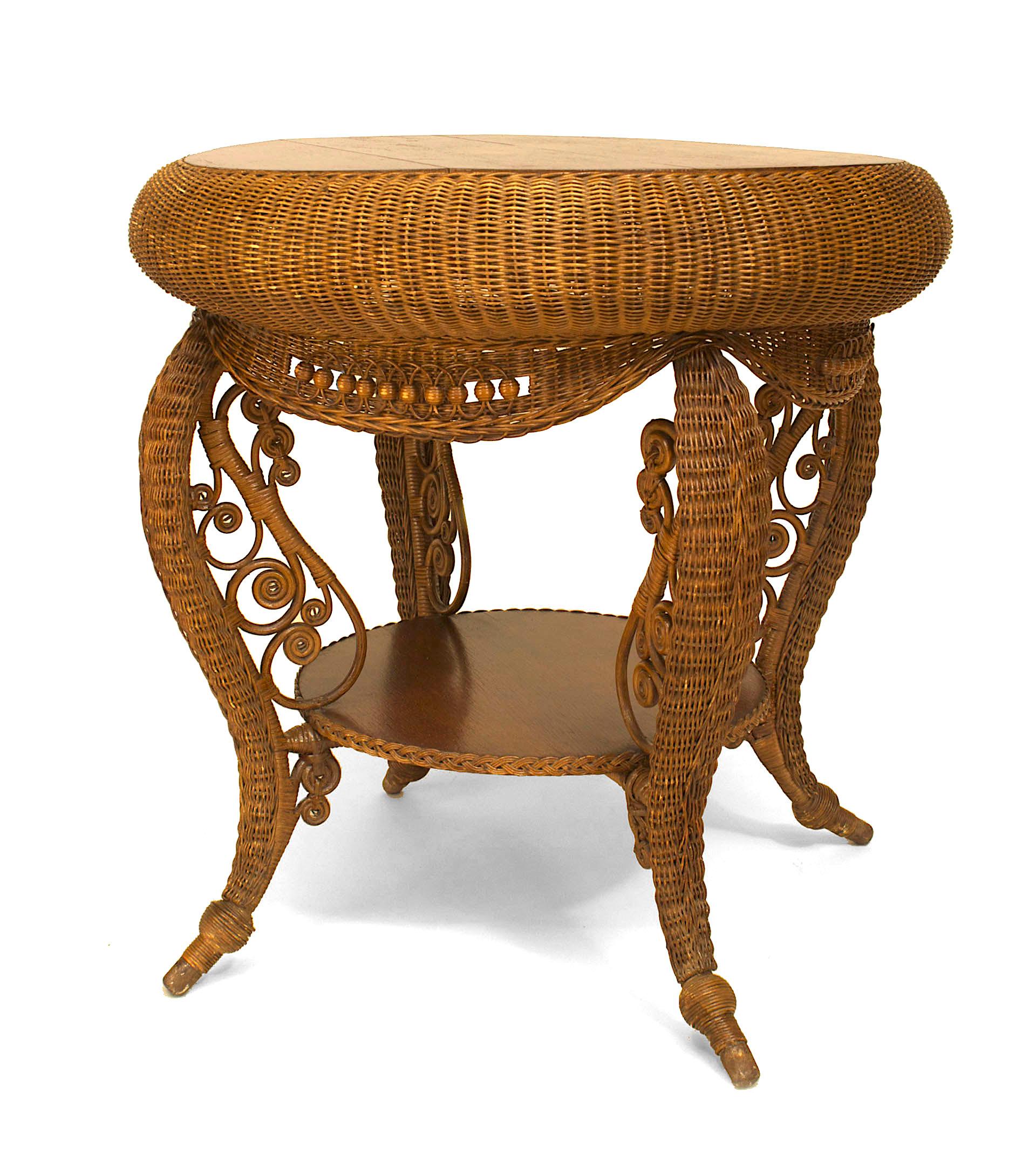 American natural wicker round oak top table with woven apron with spool trim and shaped legs with scrolls connected with a shelf (HEYWOOD-WAKEFIELD paper label)