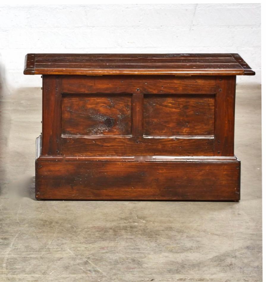 This is a charming petit 19th century Chinese storage chest or trunk. This sturdy piece is adaptable to many uses including seating. It could be the perfect rustic drinks table, bench or blanket storage piece. It retains its original waxed surface