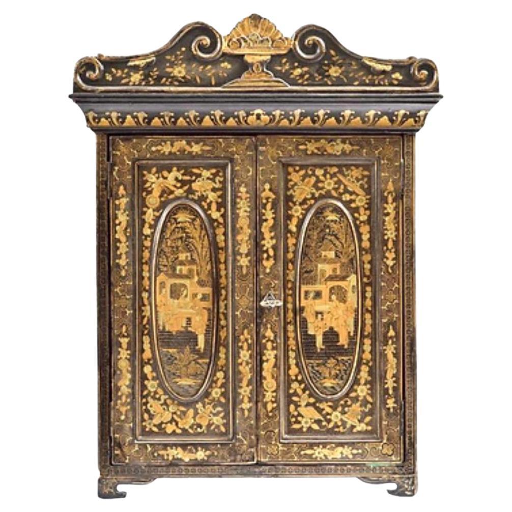 Small 19th Century Chinese Export Black and Gilt Lacquered Cabinet For Sale
