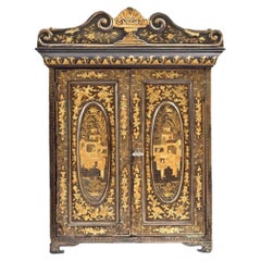 Small 19th Century Chinese Export Black and Gilt Lacquered Cabinet
