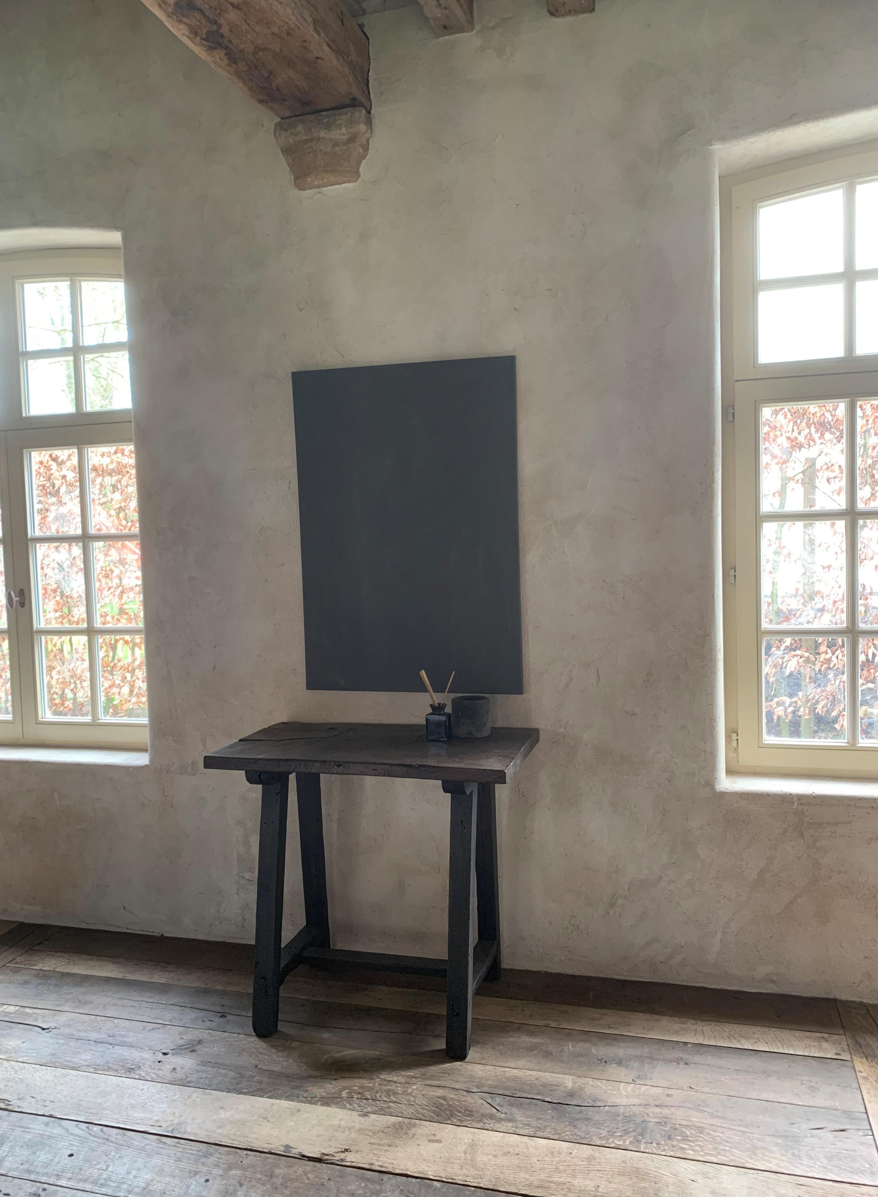 A small 19th century Spanish table with a one slab chestnut top on a softwood base. Simply made but great proportions and rare one slab chestnut top.