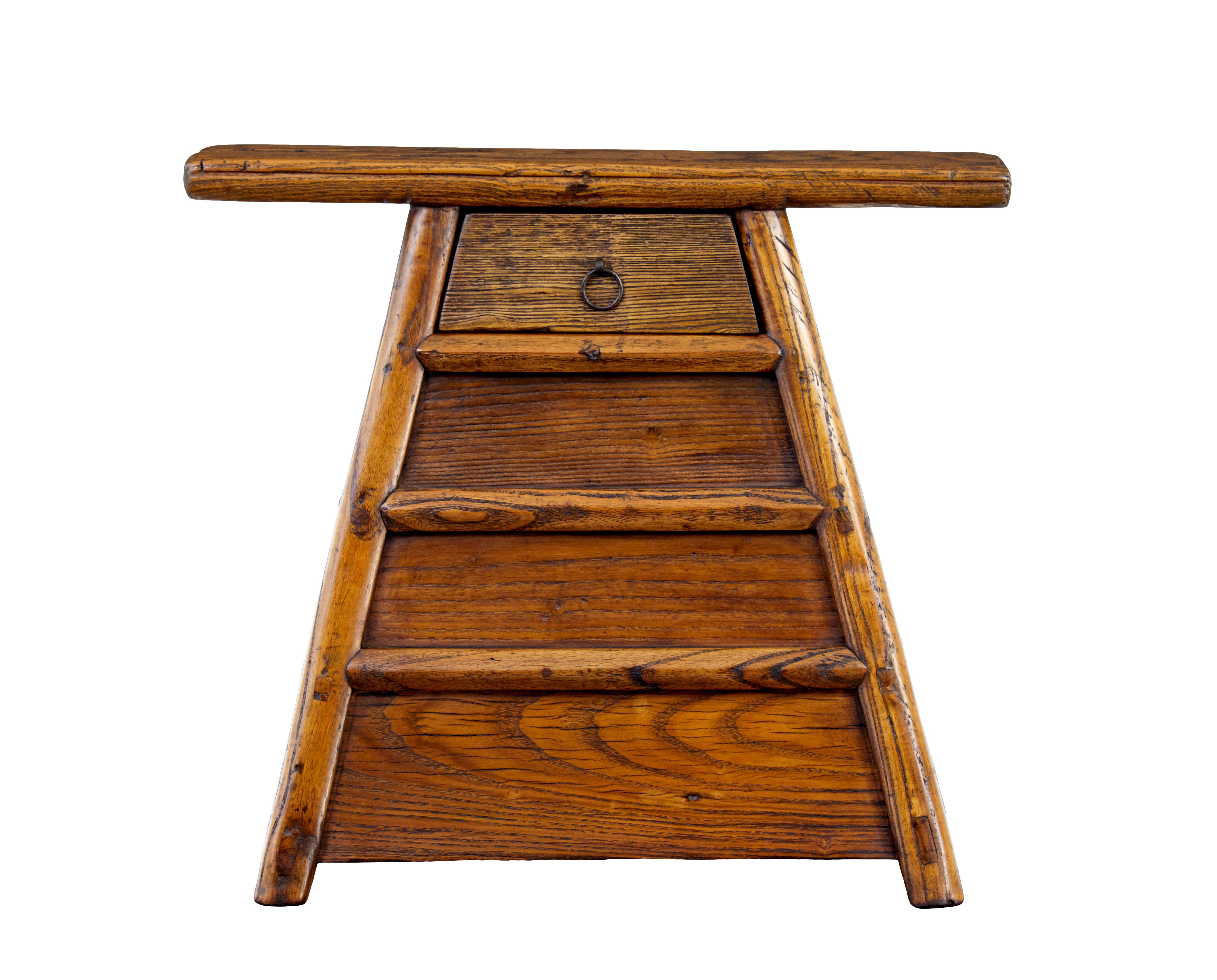 Small 19th century eastern elm table top chest circa 1890.

Superb quality Chinese pyramid shaped alter table chest made from elm.  Show frame structure with a single shallow drawer to the front and 2 deeper drawers to the right hand side, finished