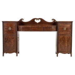 Piccola credenza inglese in mogano dello stile Regency del XIX secolo