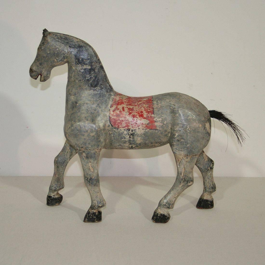 Beautiful small Folk Art wooden horse, France, circa 1850-1900. Weathered.