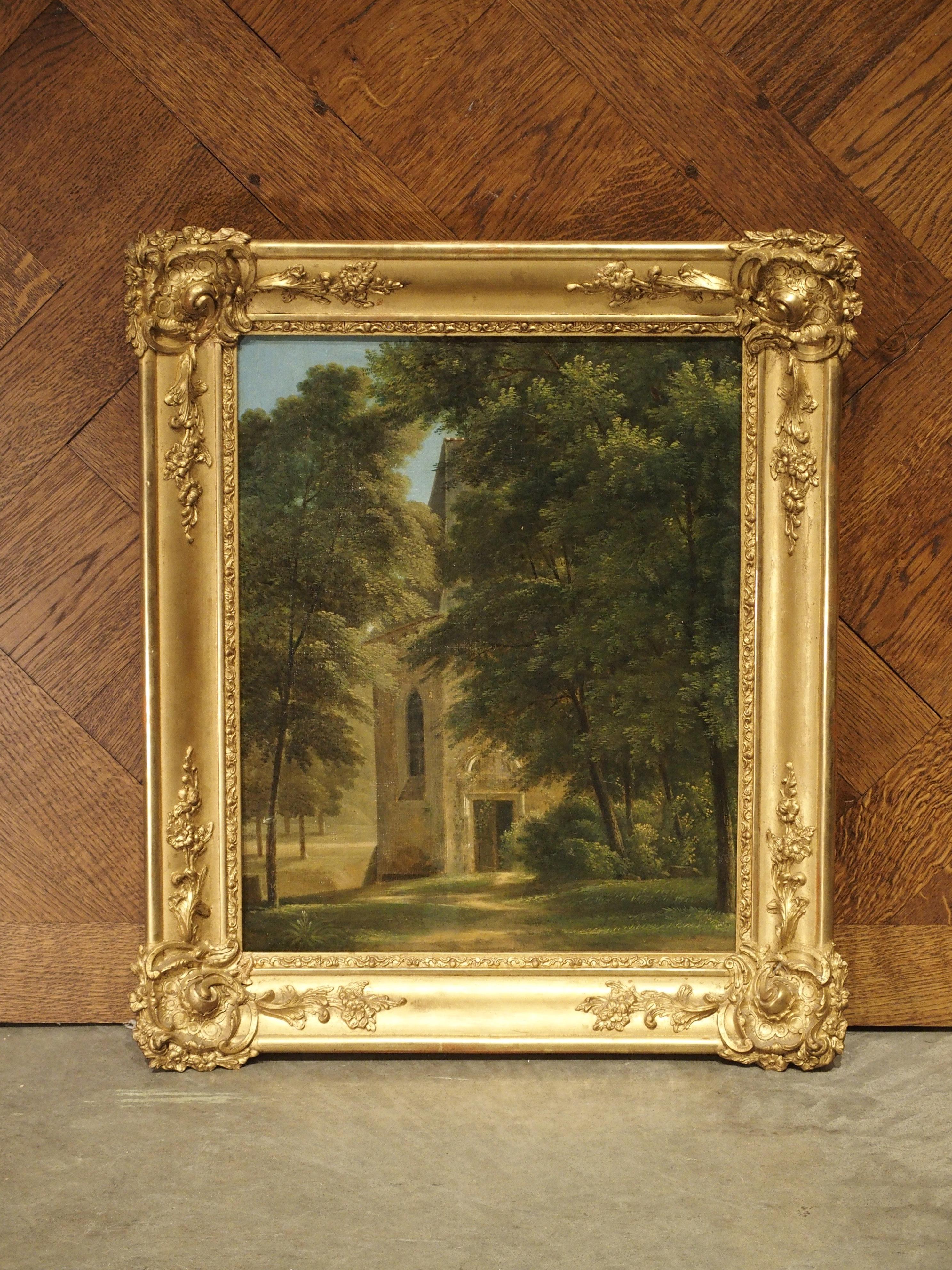 This small oil on canvas painting in a giltwood frame is of a stone chapel in a forest. The painting is from 19th century France and is attributed to the workshop Jean-Victor Bertin.

The chapel depicted in the painting is a multi-story church