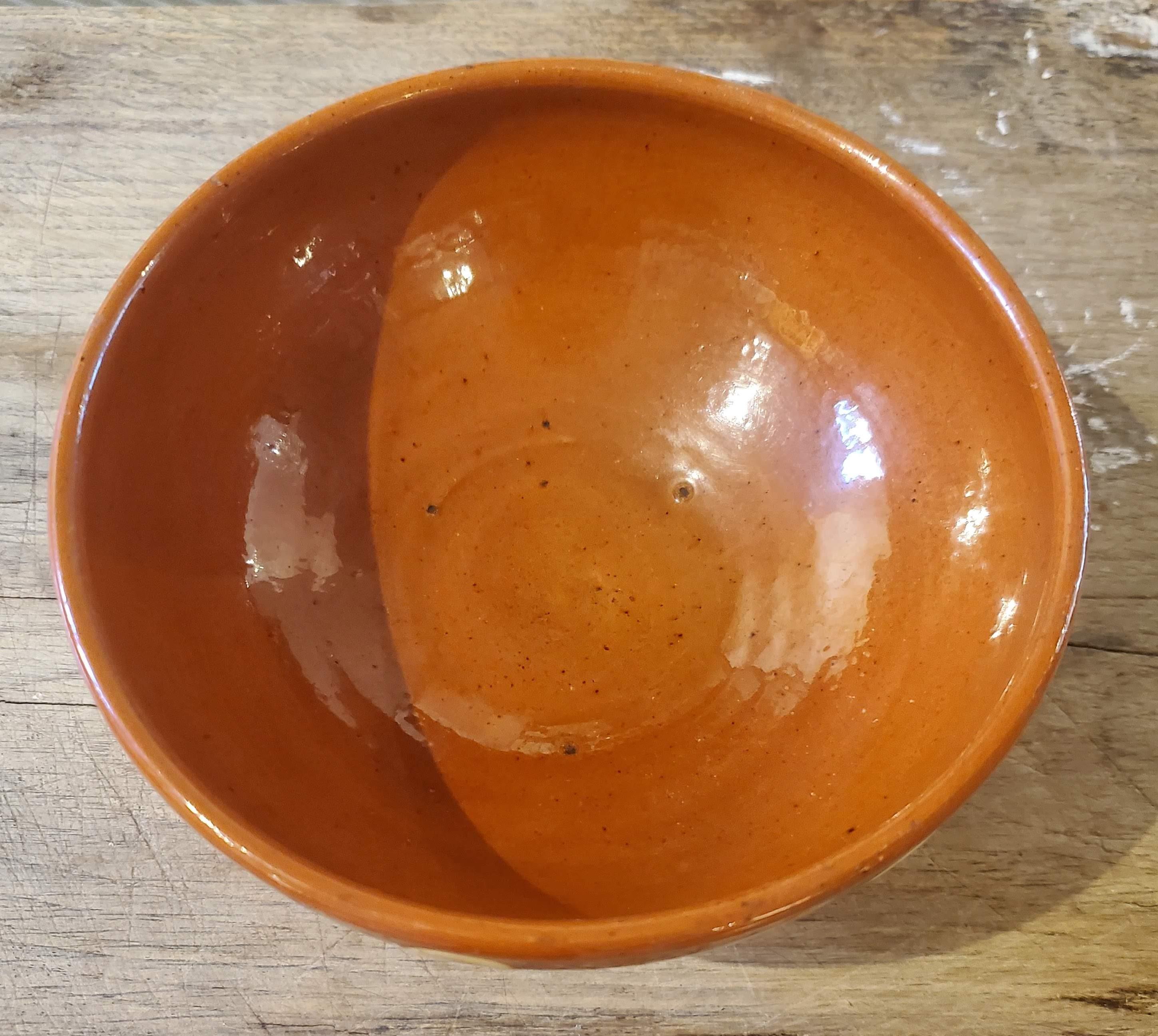 Small French Provincial terracotta bowl with cream polka dot decoration. Sweet little piece for jewelry, keys or whatever small items you need to store. 
Alsace, circa 1870.
Measures: 2.5