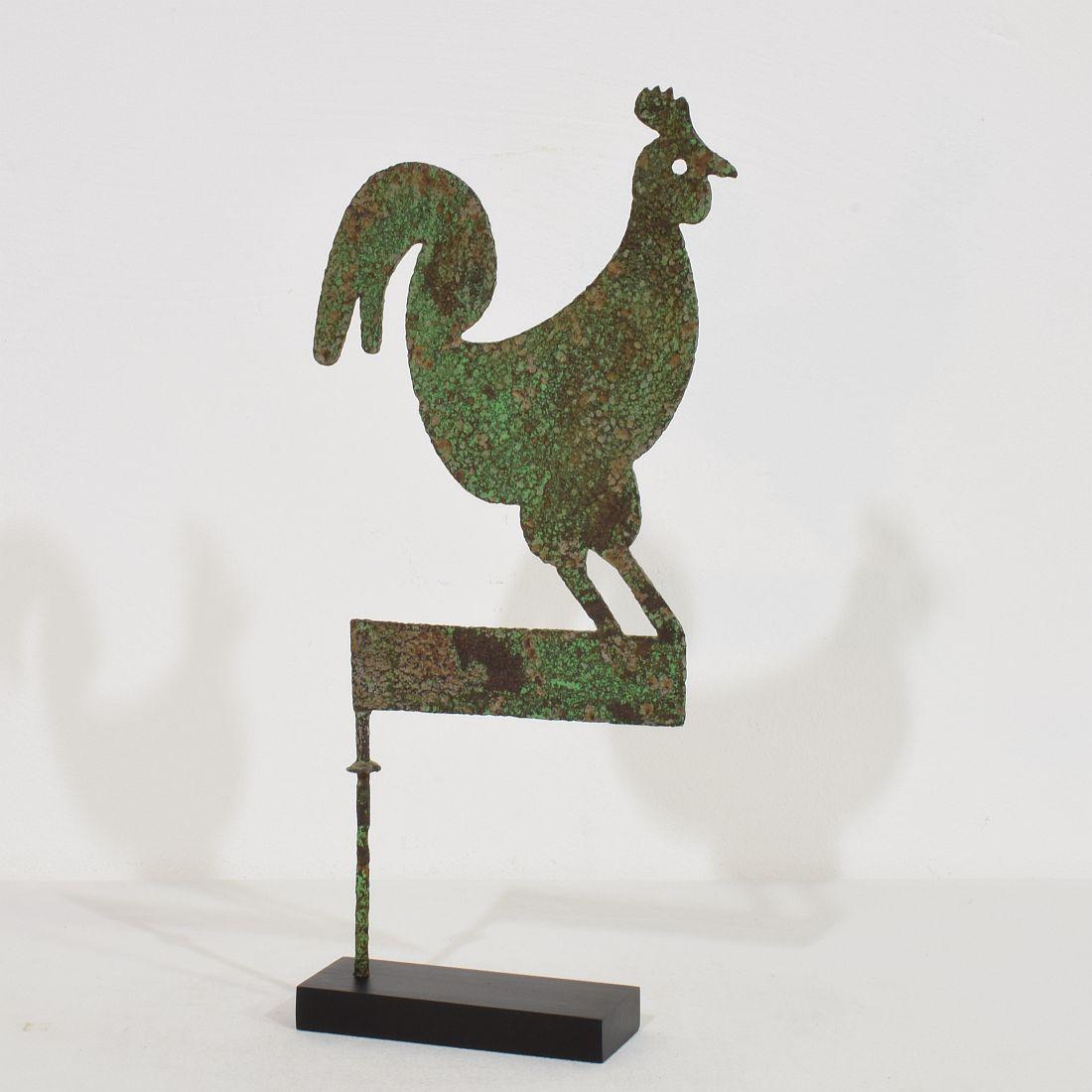 Lovely and original small antique folk art hand forged rooster weathervane with an wonderful patine. A real unique find.
France, circa 1800-1900.
Weathered condition. measurements include the wooden base.