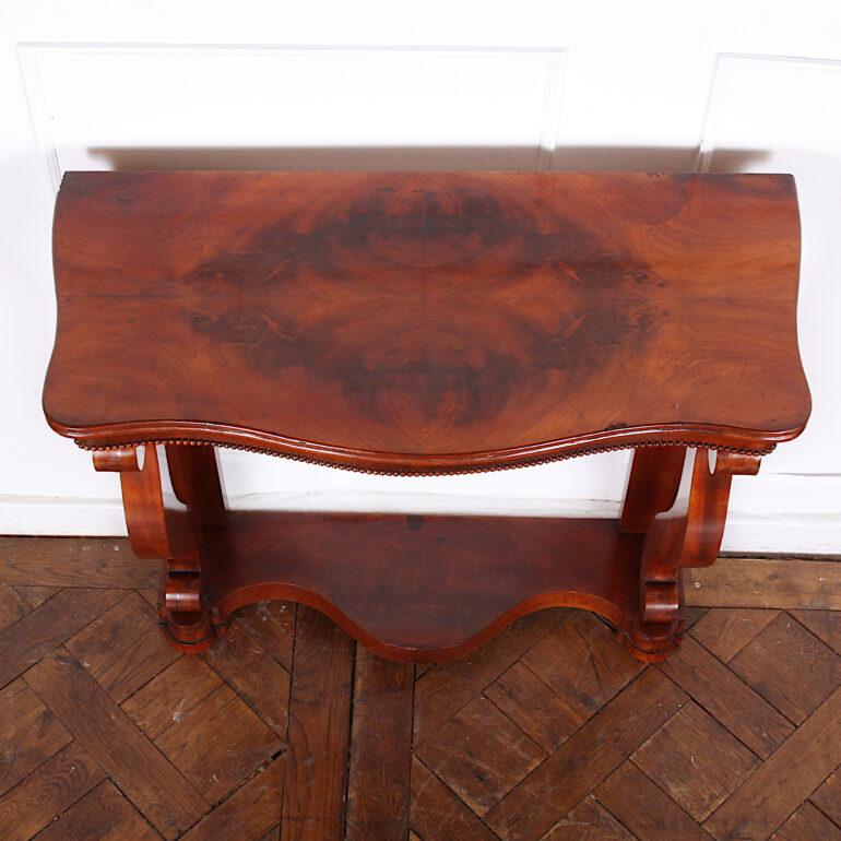 Small scaled Louis Phillippe mahogany console with simple but beautiful details. 19th Century. C.1860.