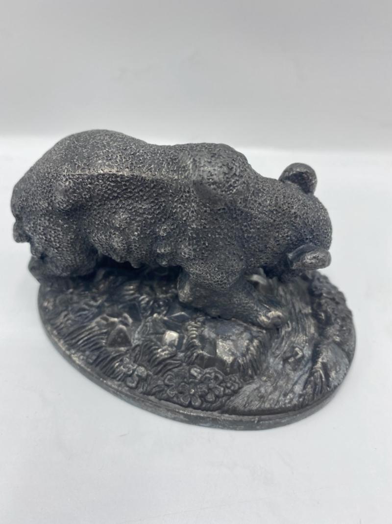Nicely molded bear figurine of unmarked metal.
Late 1800s
Measures: 3